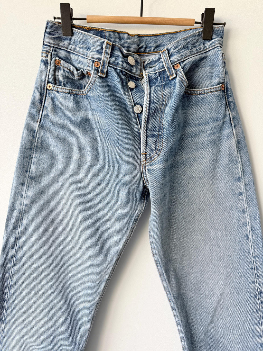 W25 L31 vintage Levis 501 24-25” measured waist light faded lines denim made in 90s