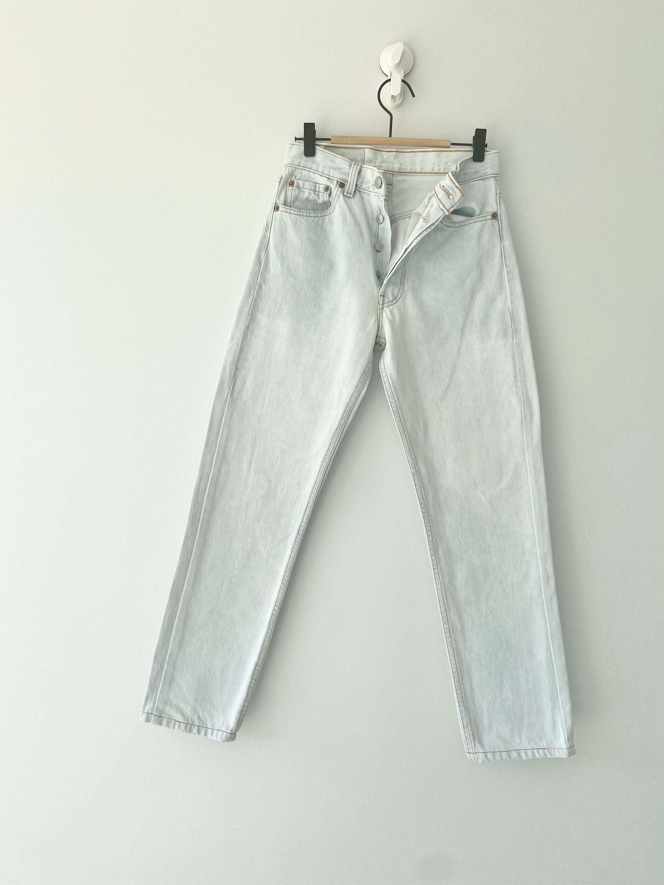 Vintage Levi’s 501 jeans w26 L27  made in USA  1995 light blue faded vintage 501 jeans