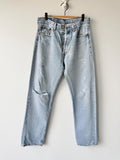 W31 L31 vintage Levis 501 30-31” measured waist light blue very distressed faded denim made in USA 90s