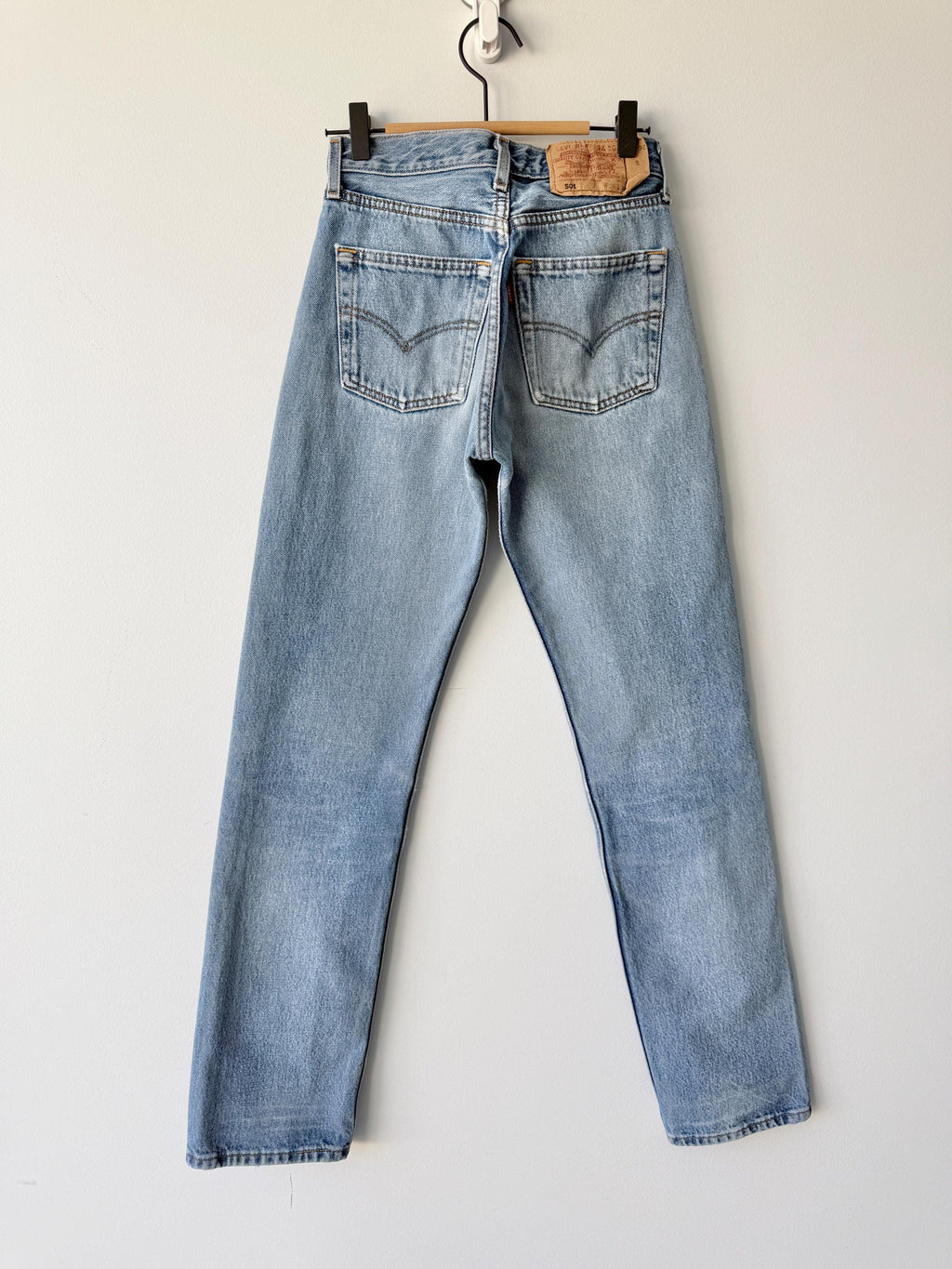 W25 L31 vintage Levis 501 24-25” measured waist light faded lines denim made in 90s