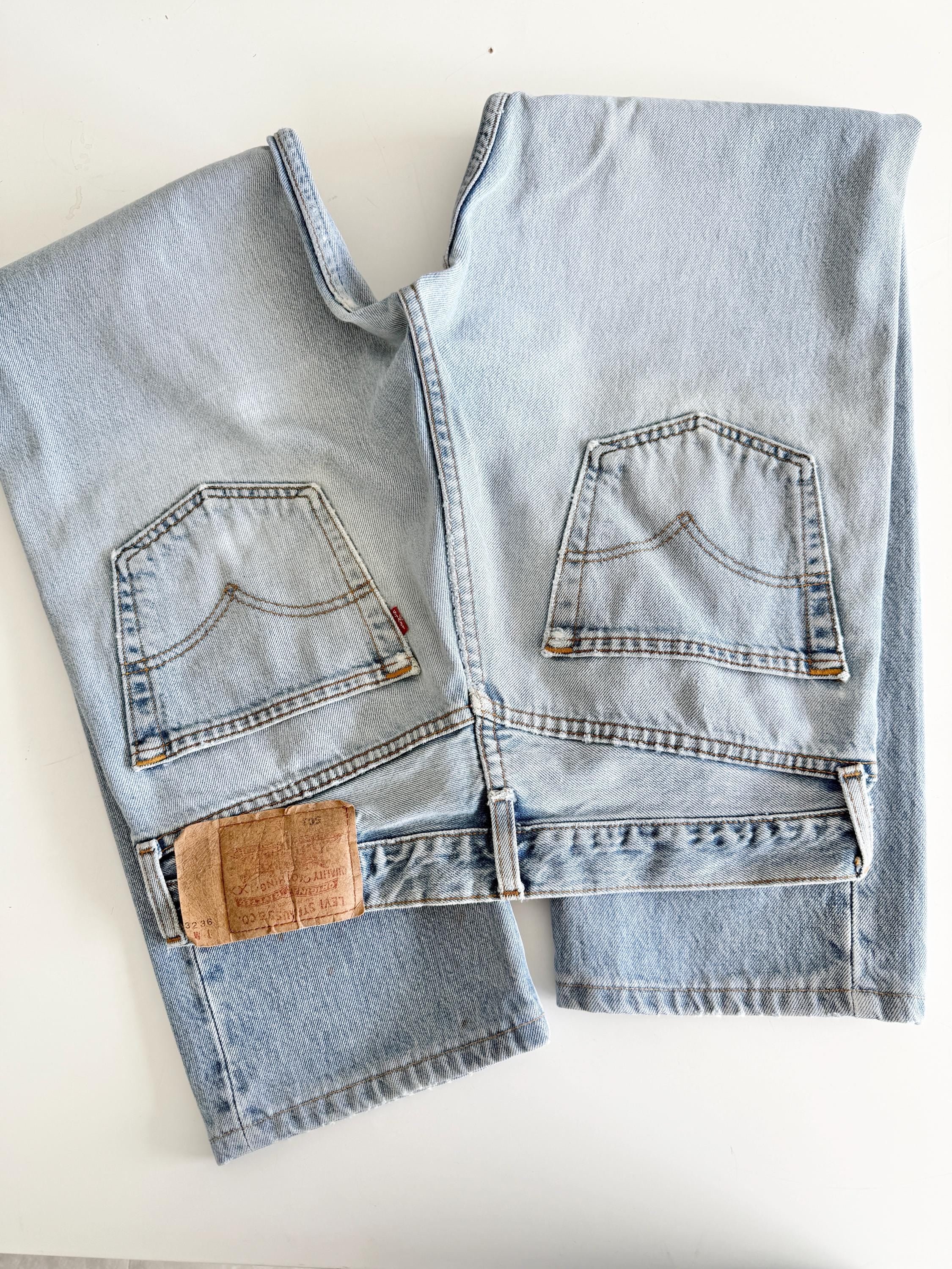 W31 L29 Levis 501 vintage 30-31” waist light faded blue distressed 501s made in Canada 90s