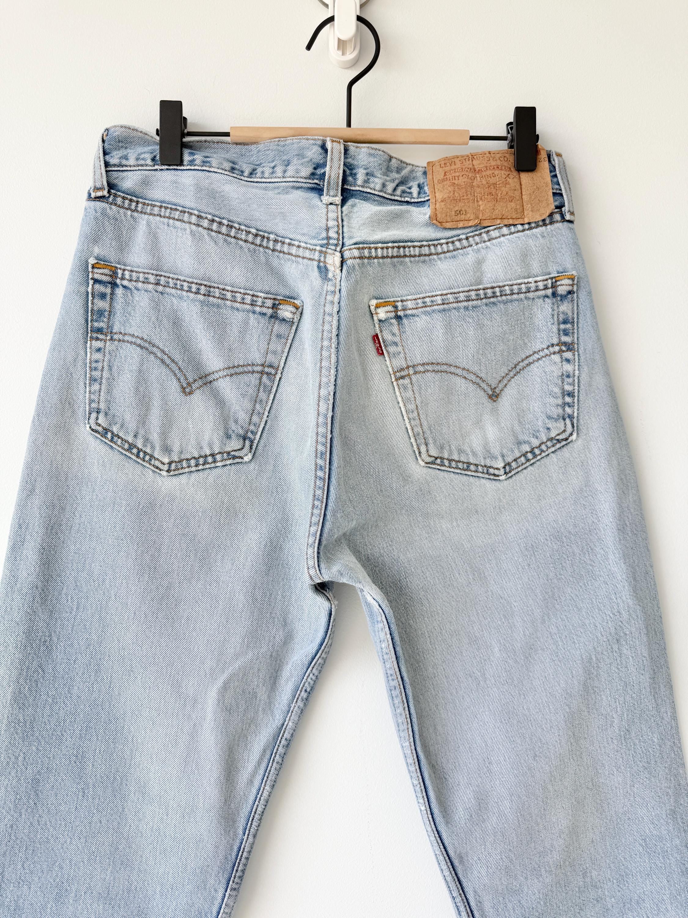W31 L29 Levis 501 vintage 30-31” waist light faded blue distressed 501s made in Canada 90s