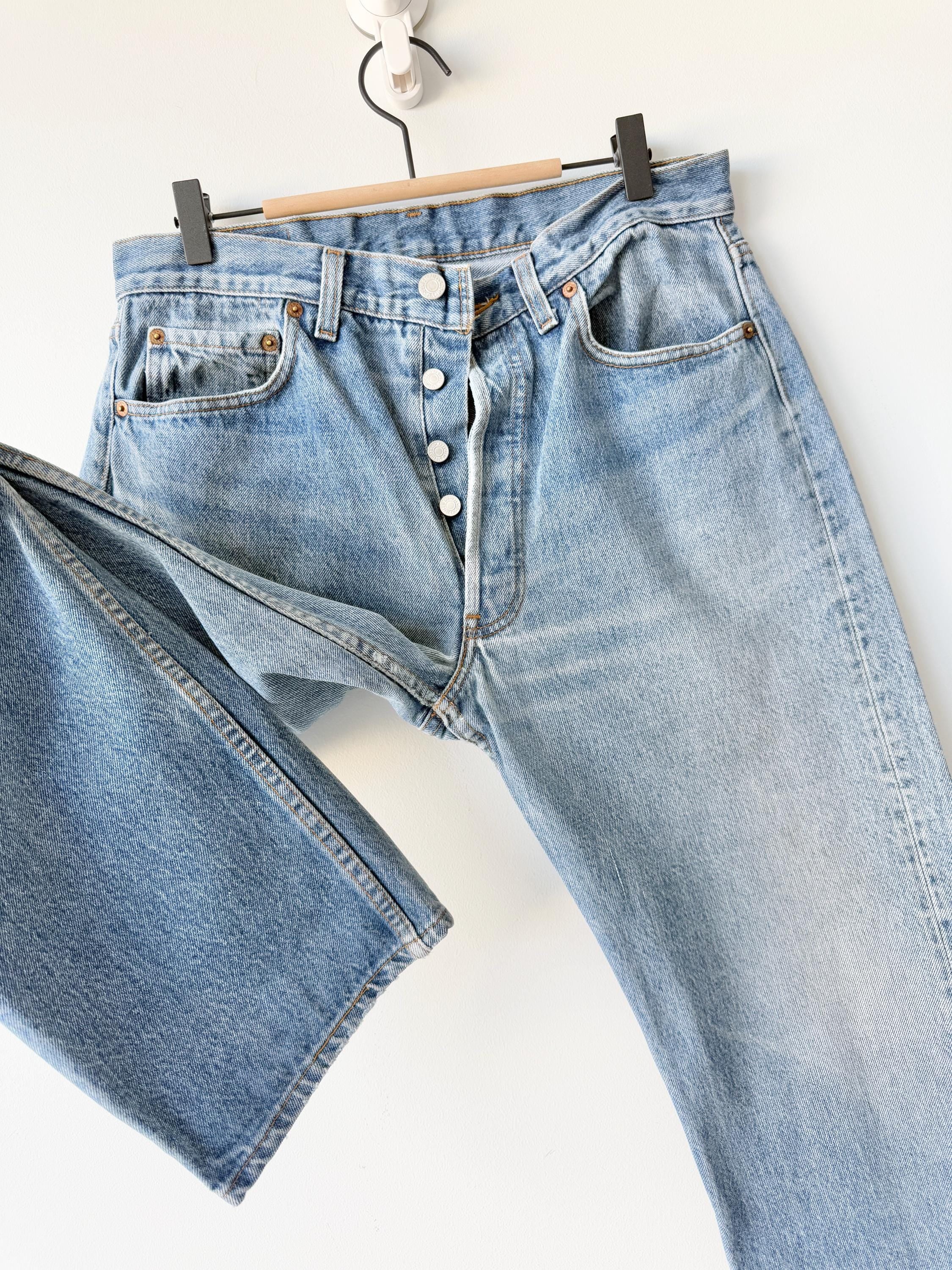 Levis 501s  vintage w31 L29 medium faded blue 501s made in USA 80s straight leg jeans 501 30”/31” waist hol