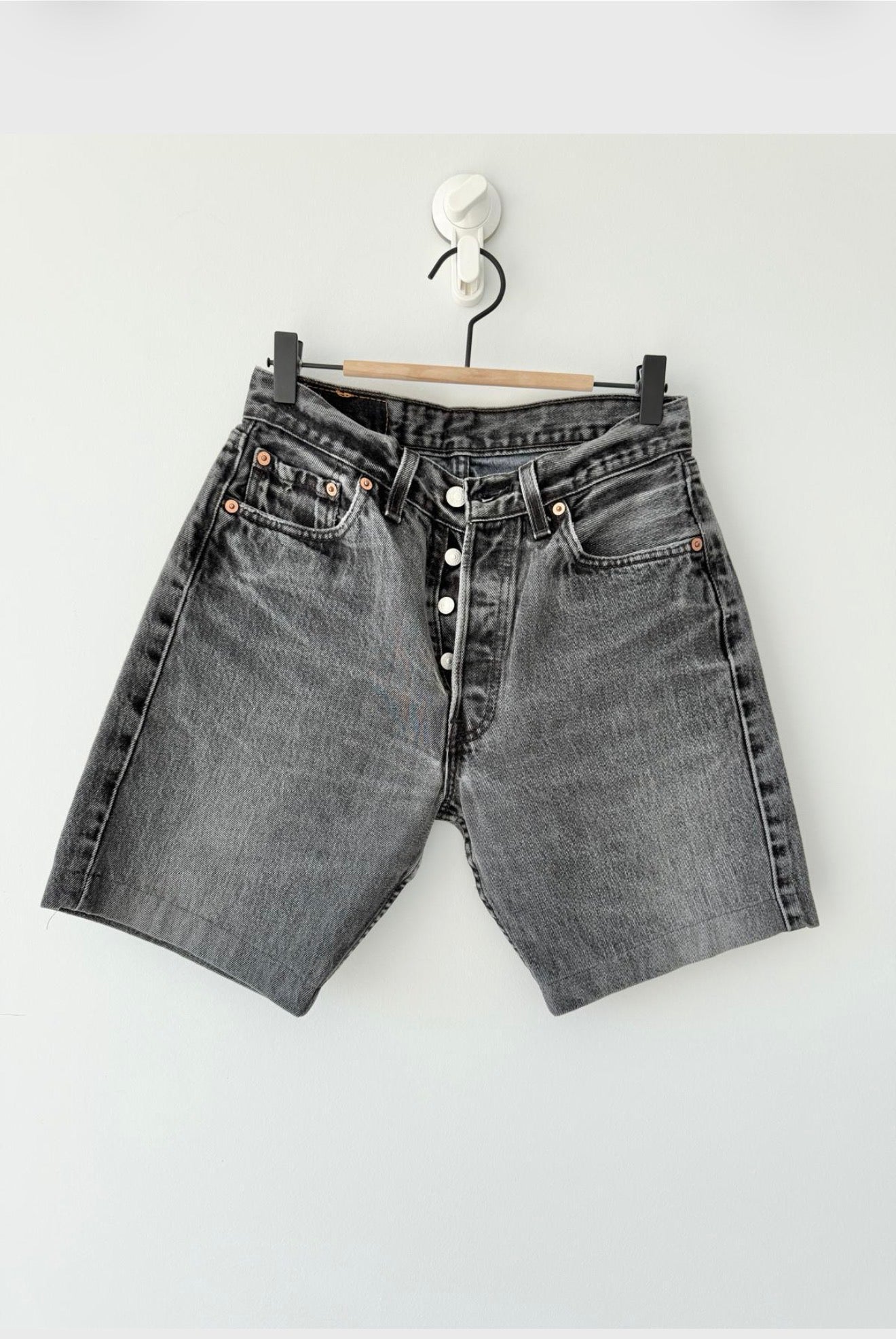 W26 Levis shorts 501 vintage 25-26” waist black faded 501s made in USA for women 90s