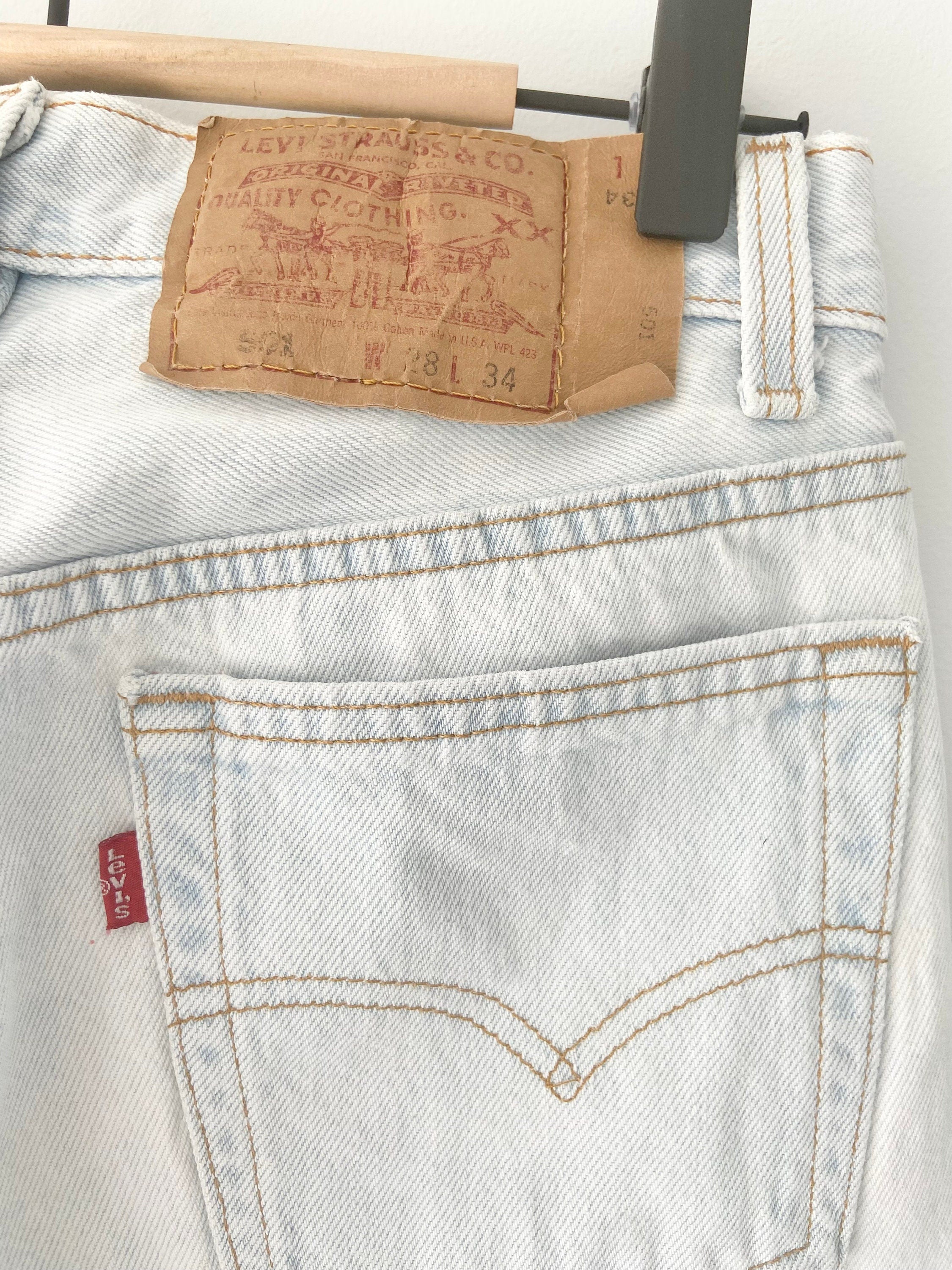 Vintage Levi’s 501 jeans w26 L27  made in USA  1995 light blue faded vintage 501 jeans