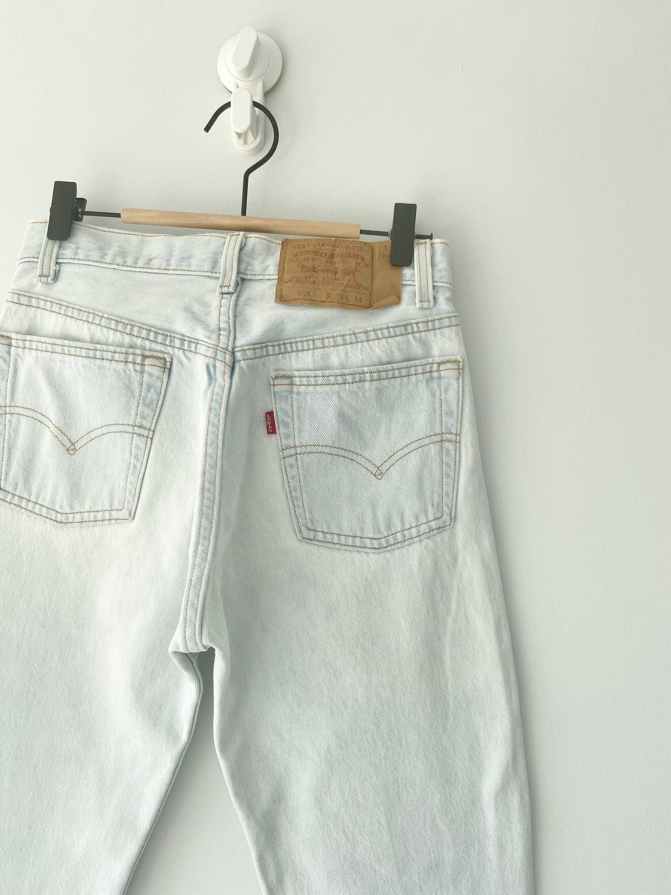 Vintage Levi’s 501 jeans w26 L27  made in USA  1995 light blue faded vintage 501 jeans