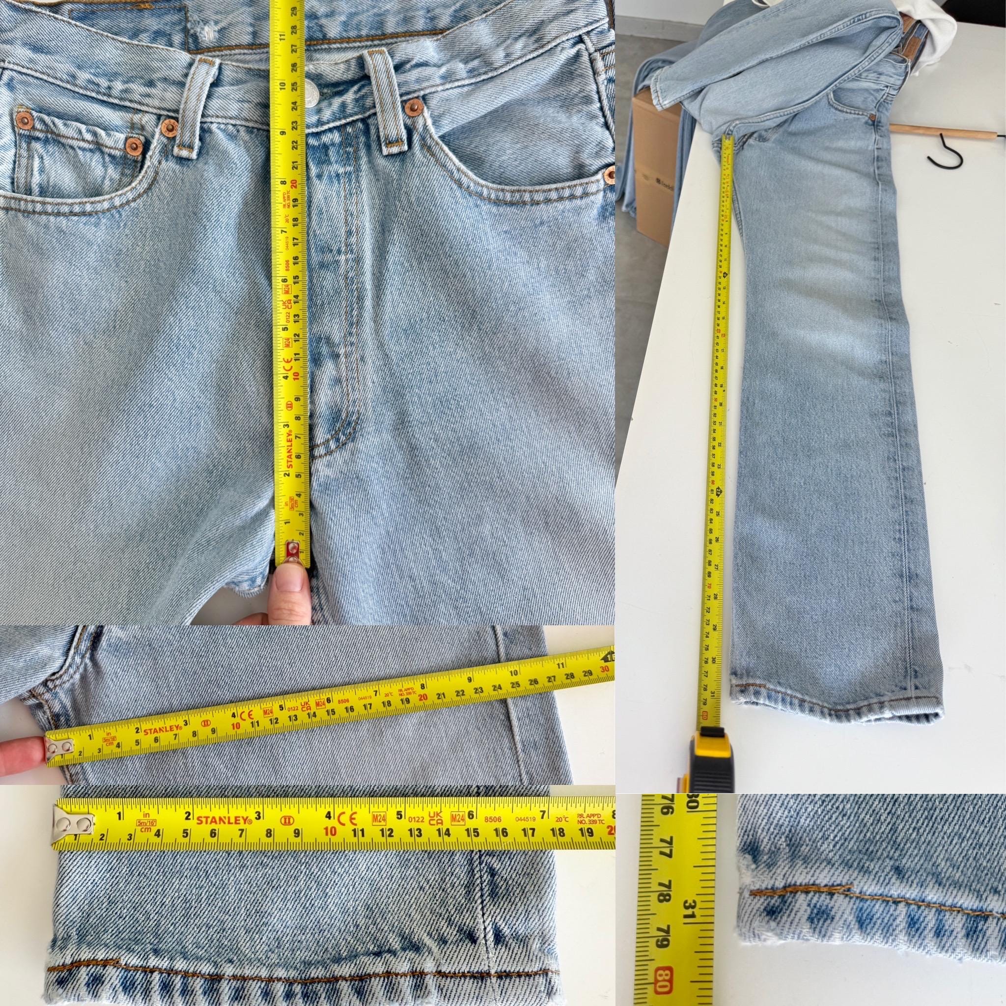 W25 L31 Levis 501 vintage 25” measured waist medium light blue made in 90s