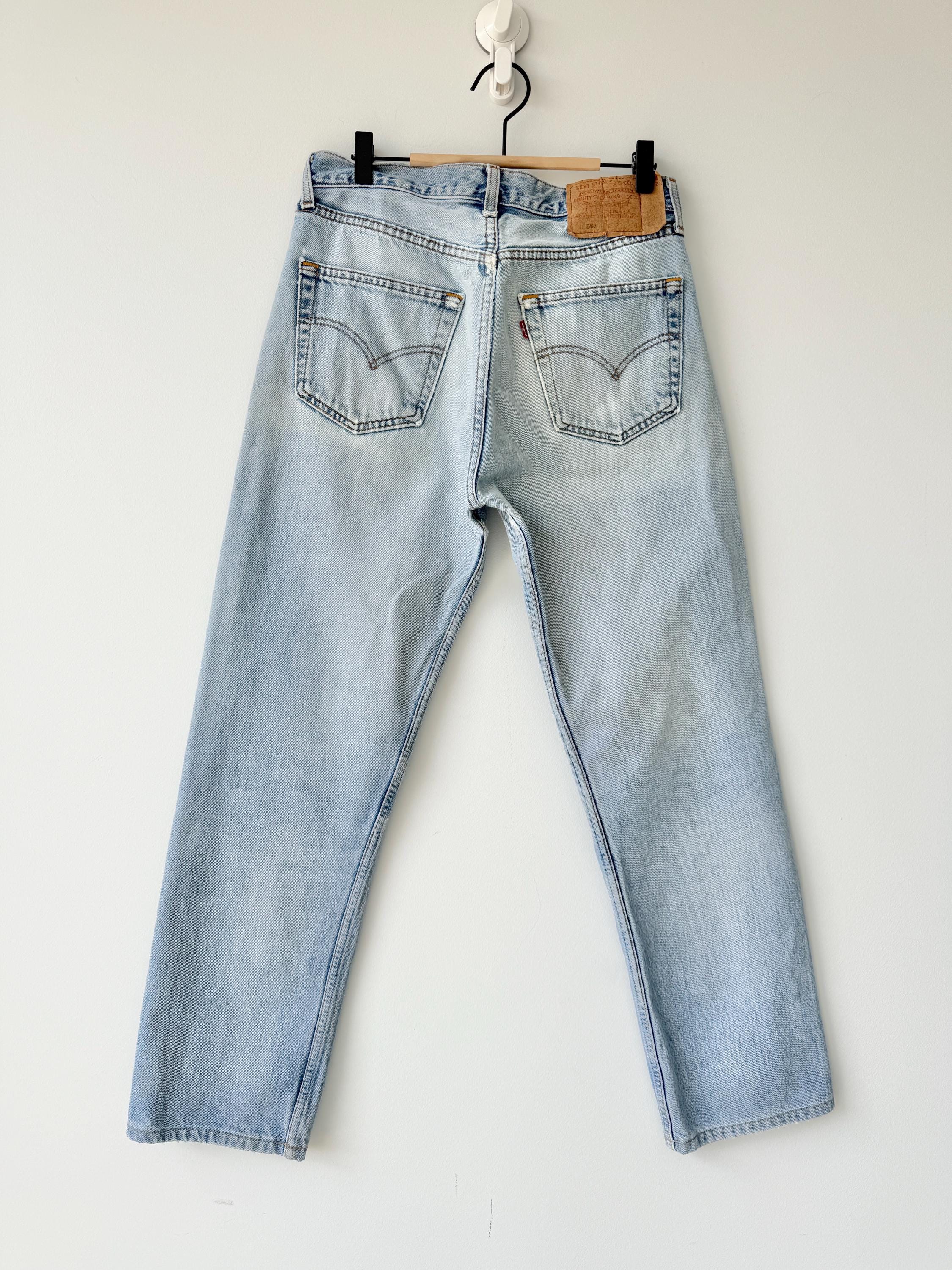 W31 L29 Levis 501 vintage 30-31” waist light faded blue distressed 501s made in Canada 90s