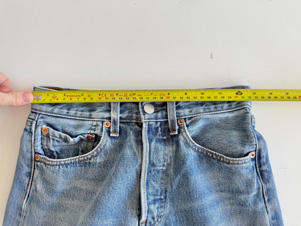 W25 L31 vintage Levis 501 24-25” measured waist light faded lines denim made in 90s