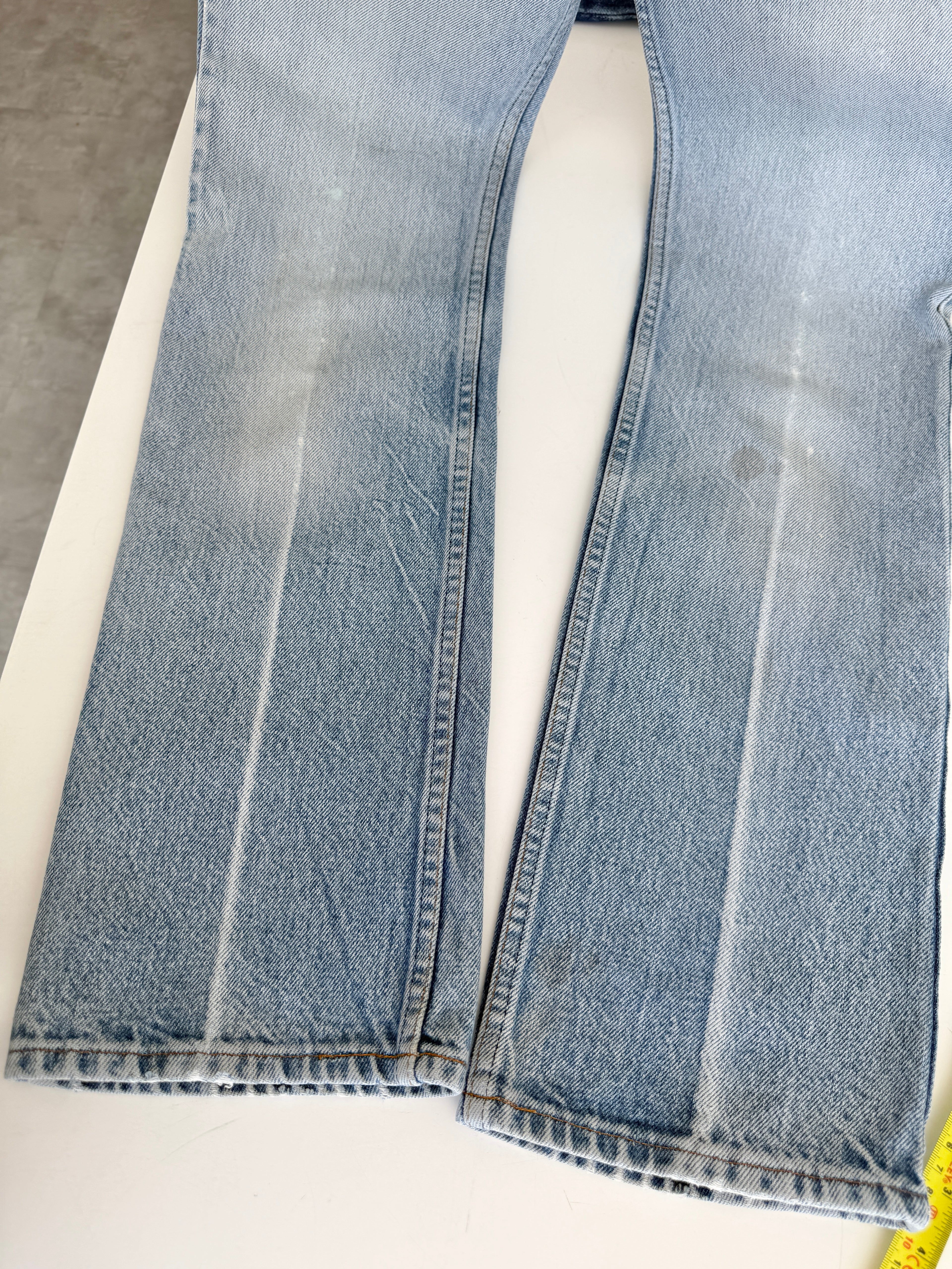 W25 L30 vintage Levis 716 25” measured waist light faded blue USA 70s 716s