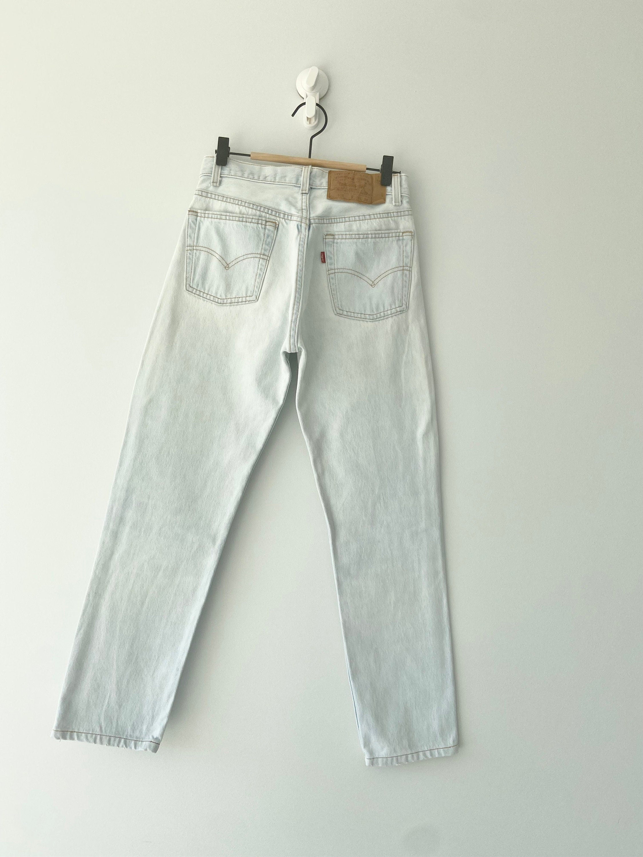 Vintage Levi’s 501 jeans w26 L27  made in USA  1995 light blue faded vintage 501 jeans
