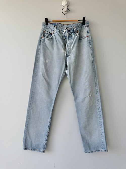 Distressed W28 L29 vintage Levis 501 27/28” measured light faded blue denim 90’s 501s USA student fit
