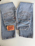 W22 L28 vintage Levis 501 20-22” measured waist medium faded denim made in 90s