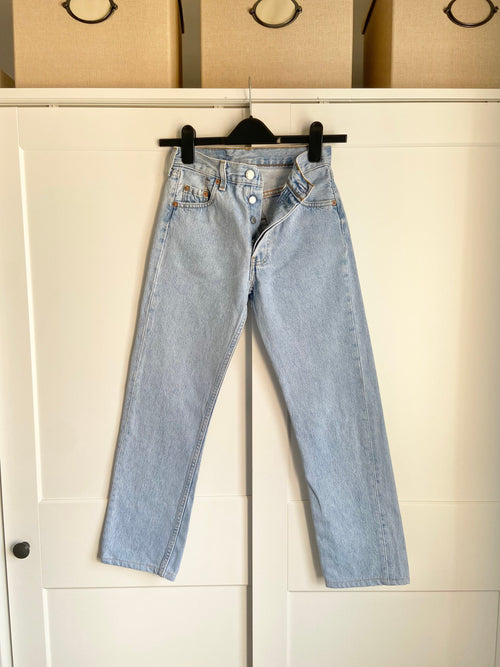 Levis 501 jeans w24 L25  light blue denim 501 made in France  vintage Levi’s faded light blue denim 90s vintage