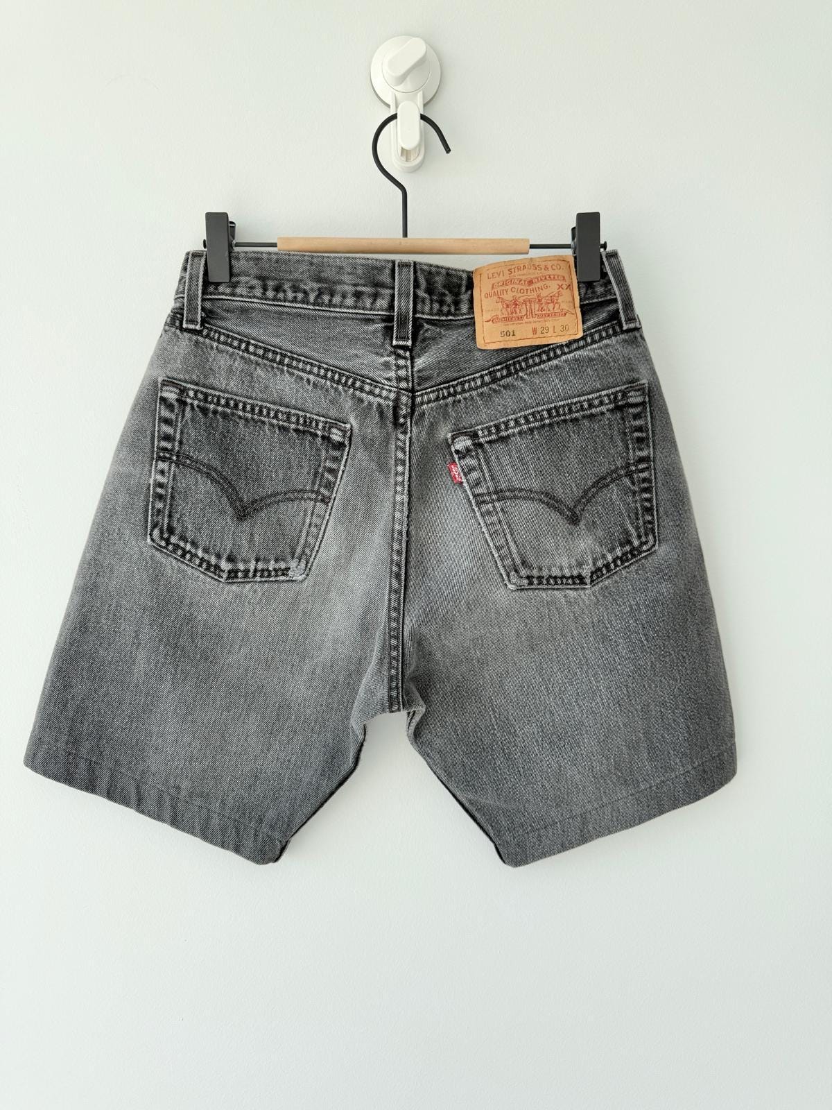 W26 Levis 501 vintage 25-26” waist black faded 501s made in USA for women 90s