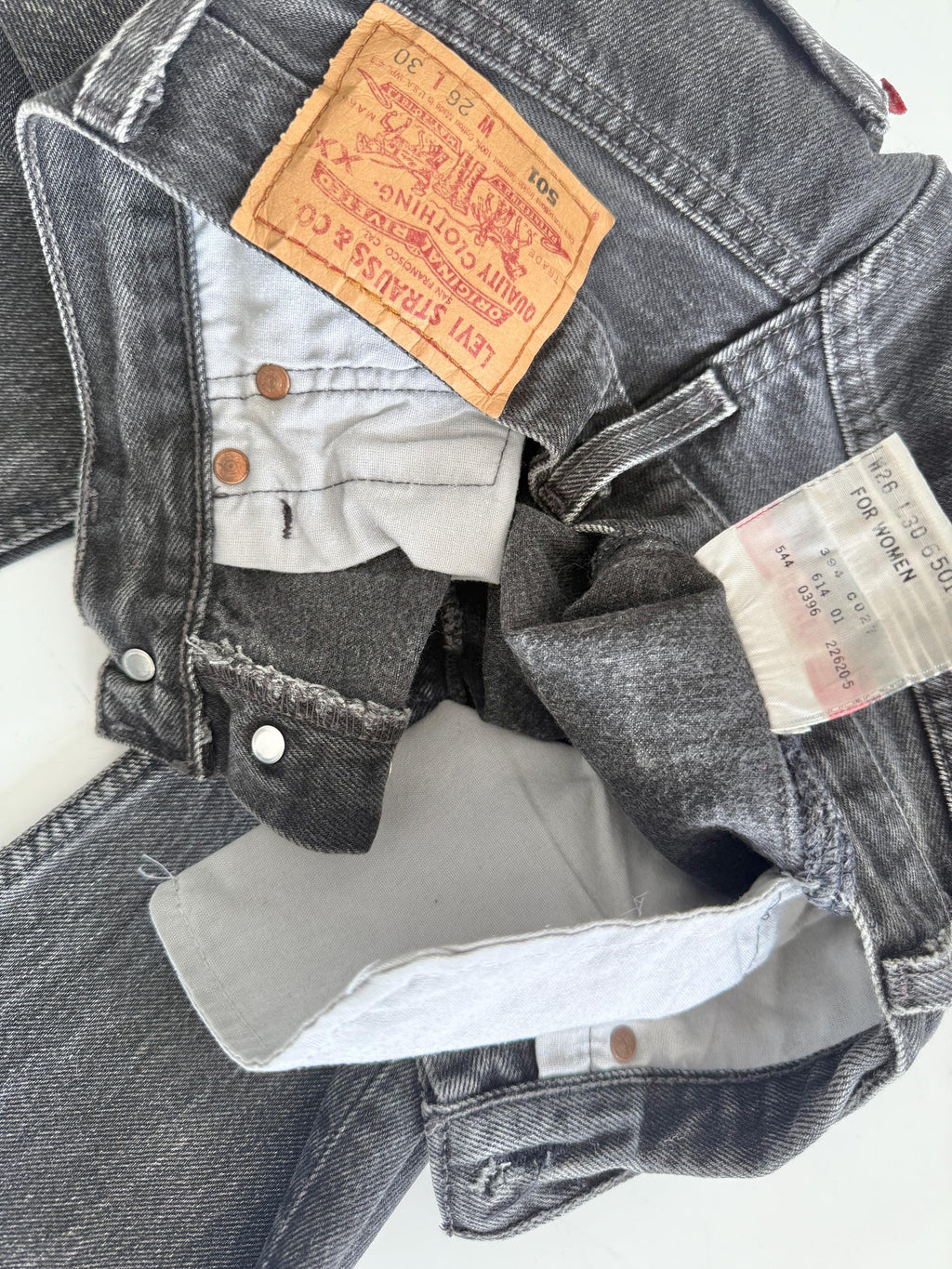 W24 L29 Levis 501 vintage 23-24” waist black faded grey 501s made in USA for women 90s