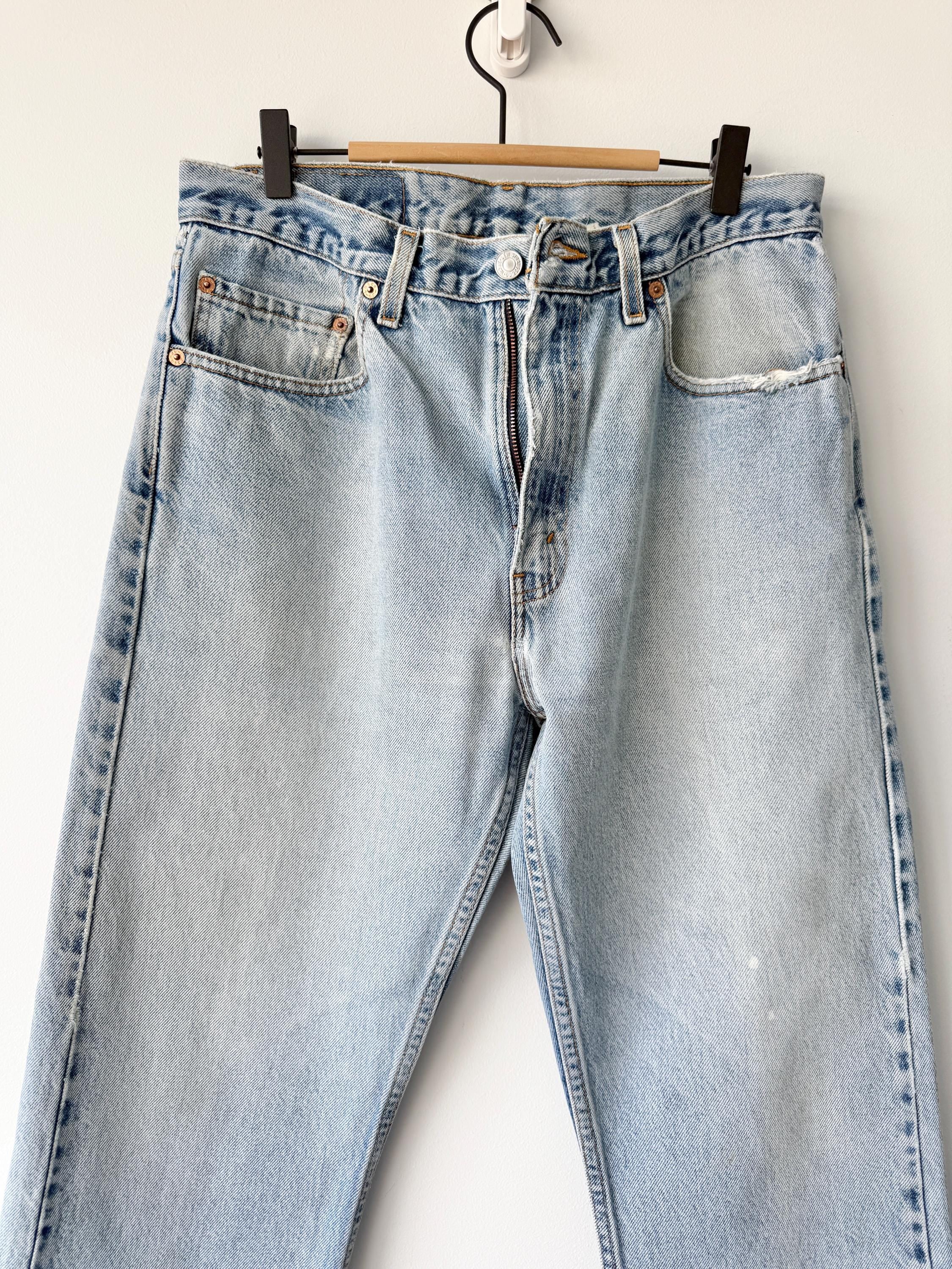 W31 L28 vintage Levis 505 31” measured waist faded light blue made