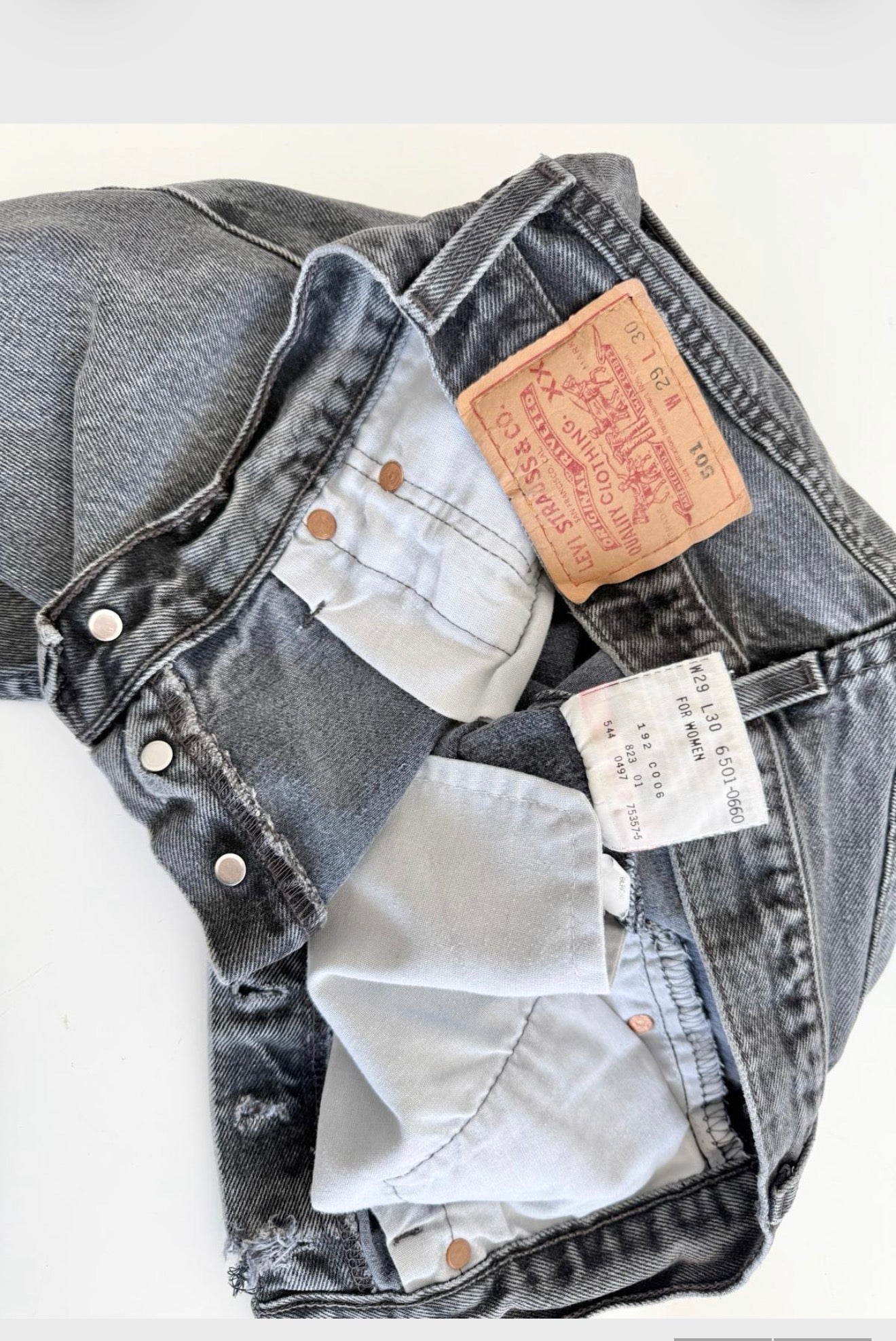 W26 Levis shorts 501 vintage 25-26” waist black faded 501s made in USA for women 90s