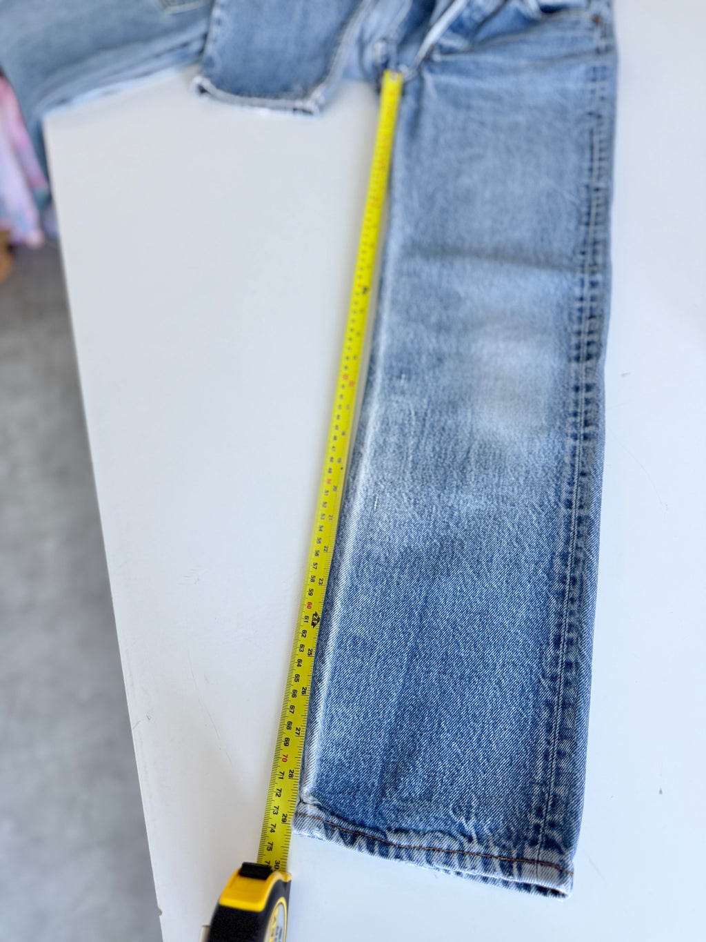 W23 L29 vintage Levis 701 22-24” measured waist faded denim made in USA 80s