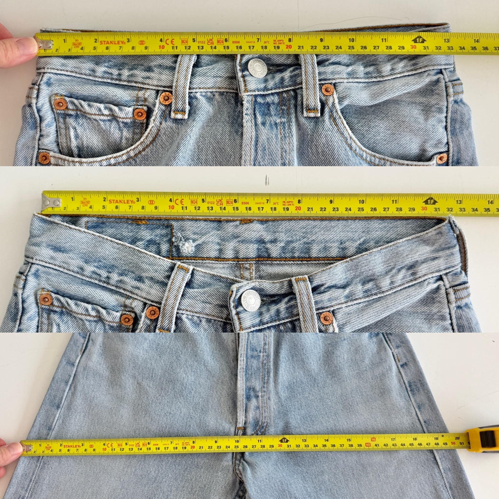 W25 L31 Levis 501 vintage 25” measured waist medium light blue made in 90s