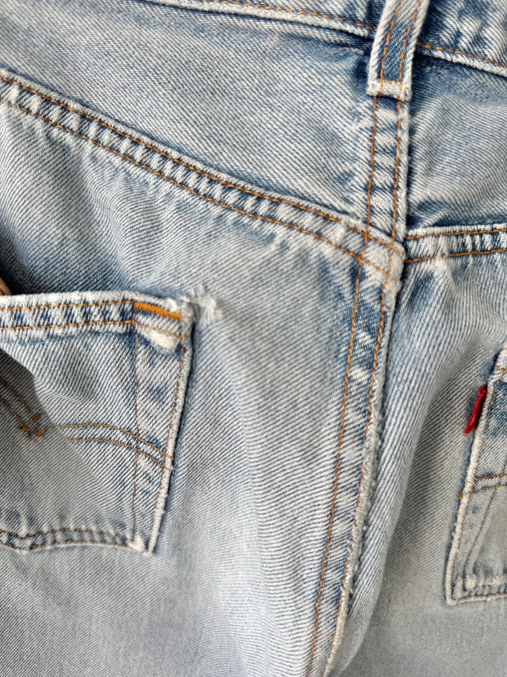W31 L31 vintage Levis 501 30-31” measured waist light blue very distressed faded denim made in USA 90s