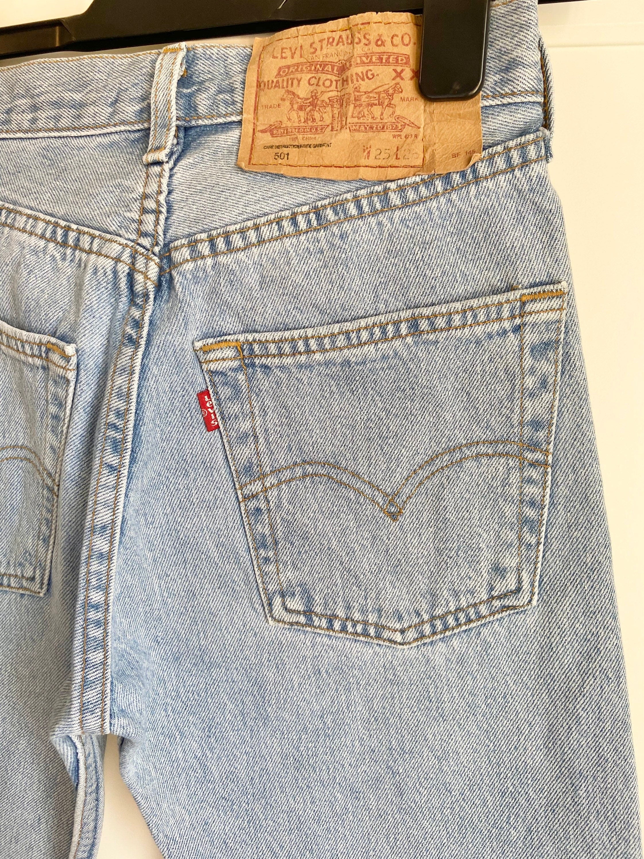 Levis 501 jeans w24 L25  light blue denim 501 made in France  vintage Levi’s faded light blue denim 90s vintage