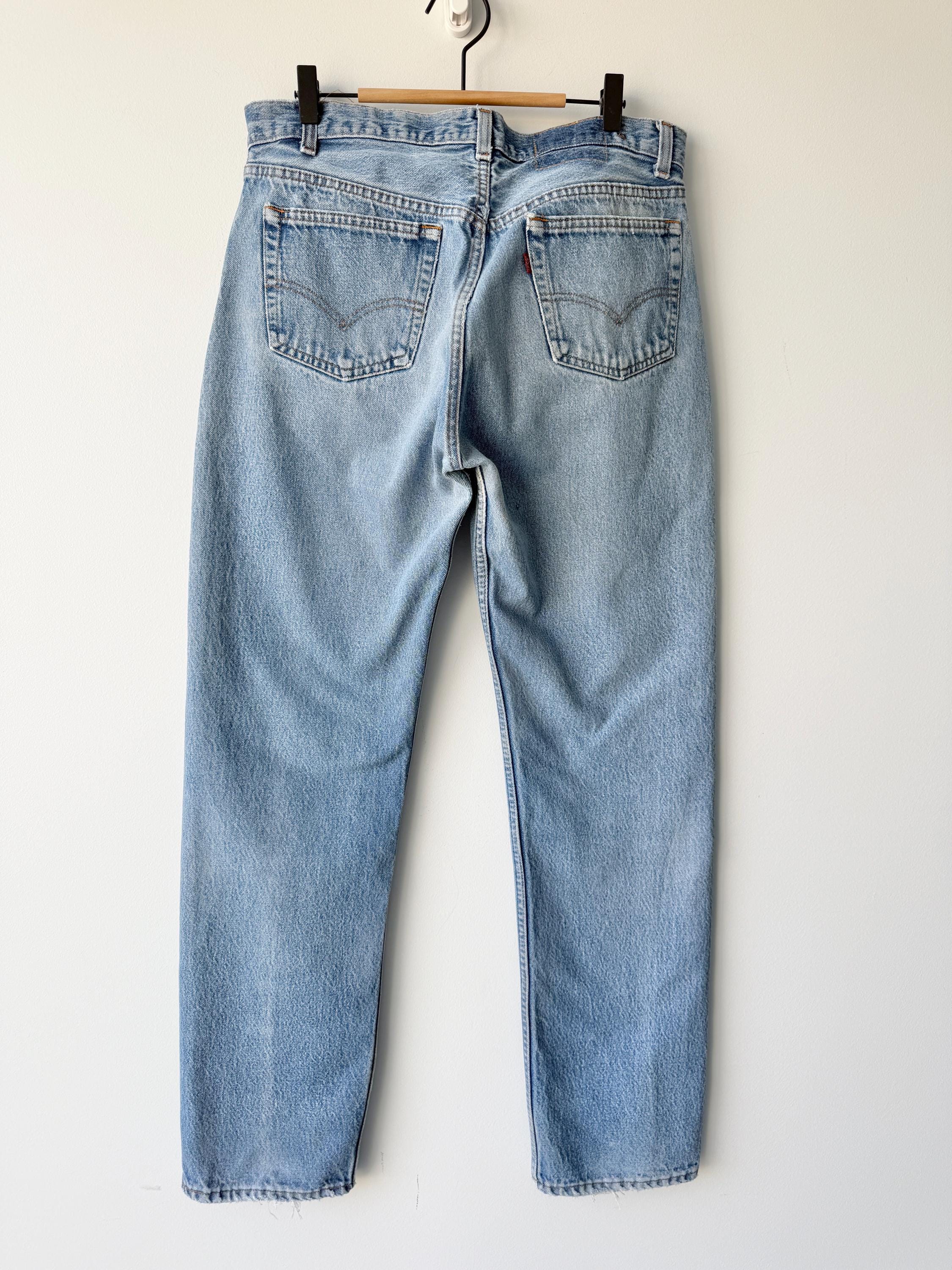 W31 L32 vintage Levis 501 30-31” measured waist medium faded denim made in USA 80s