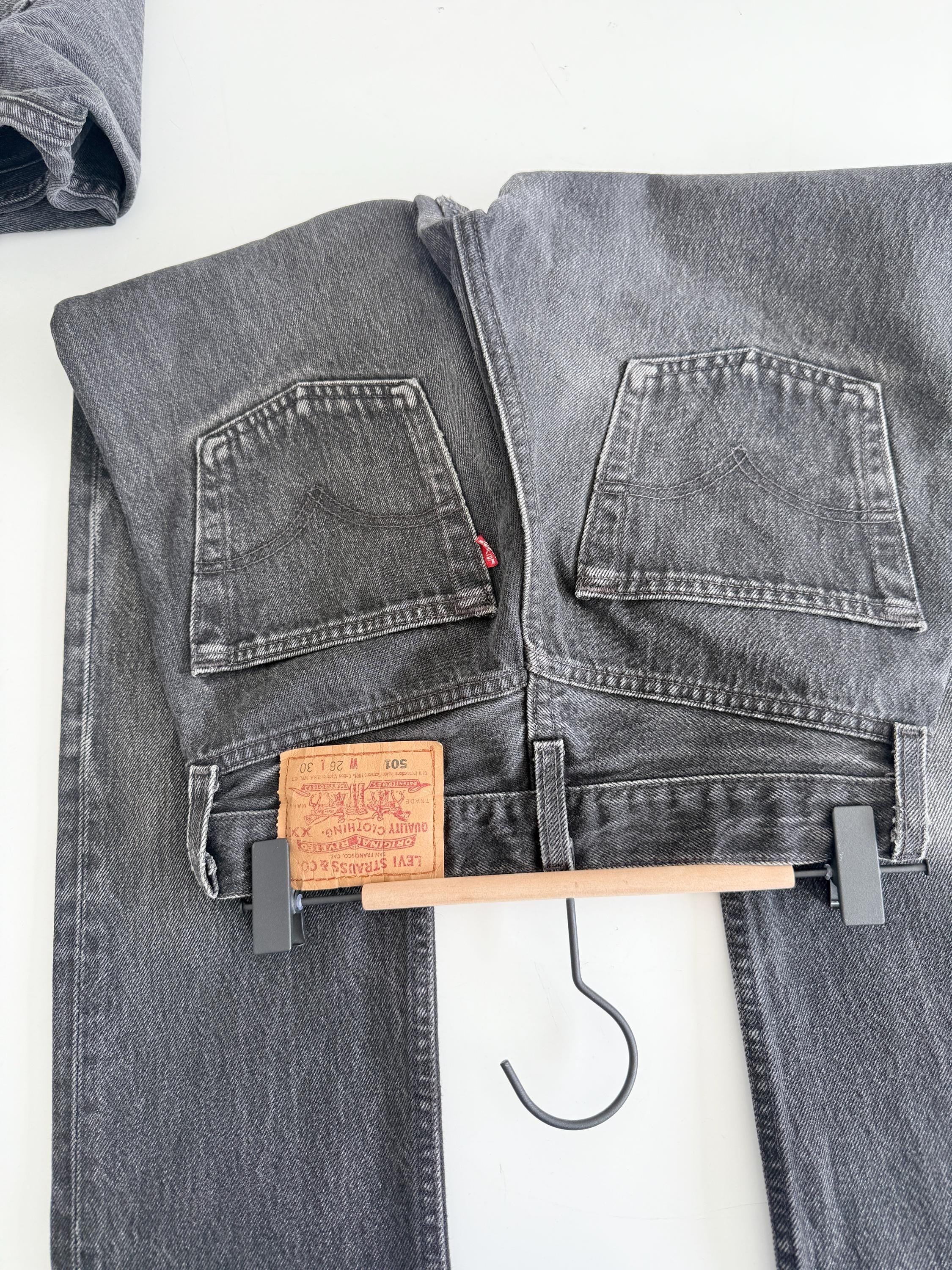 W24 L29 Levis 501 vintage 23-24” waist black faded grey 501s made in USA for women 90s