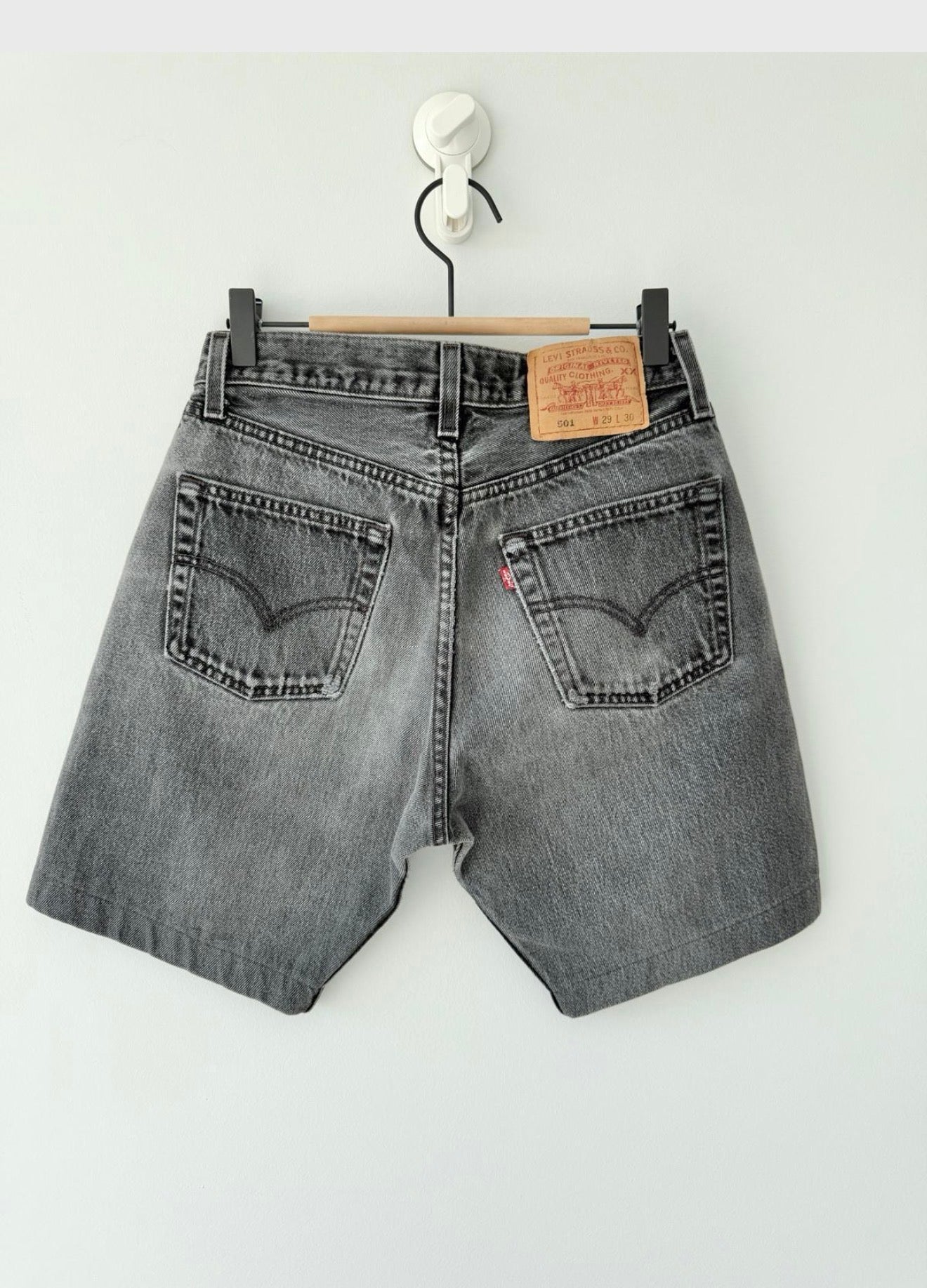 W26 Levis shorts 501 vintage 25-26” waist black faded 501s made in USA for women 90s