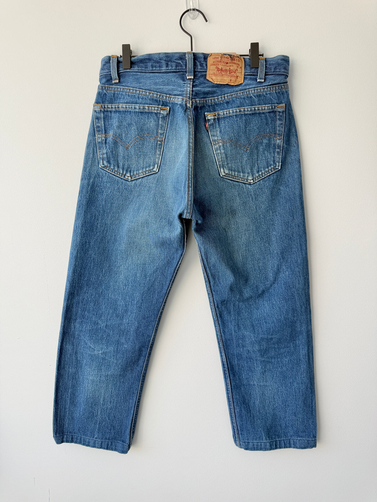 W31 L26 vintage Levis 501 0115 dark blue 30/31” measured waist 501s 80s USA
