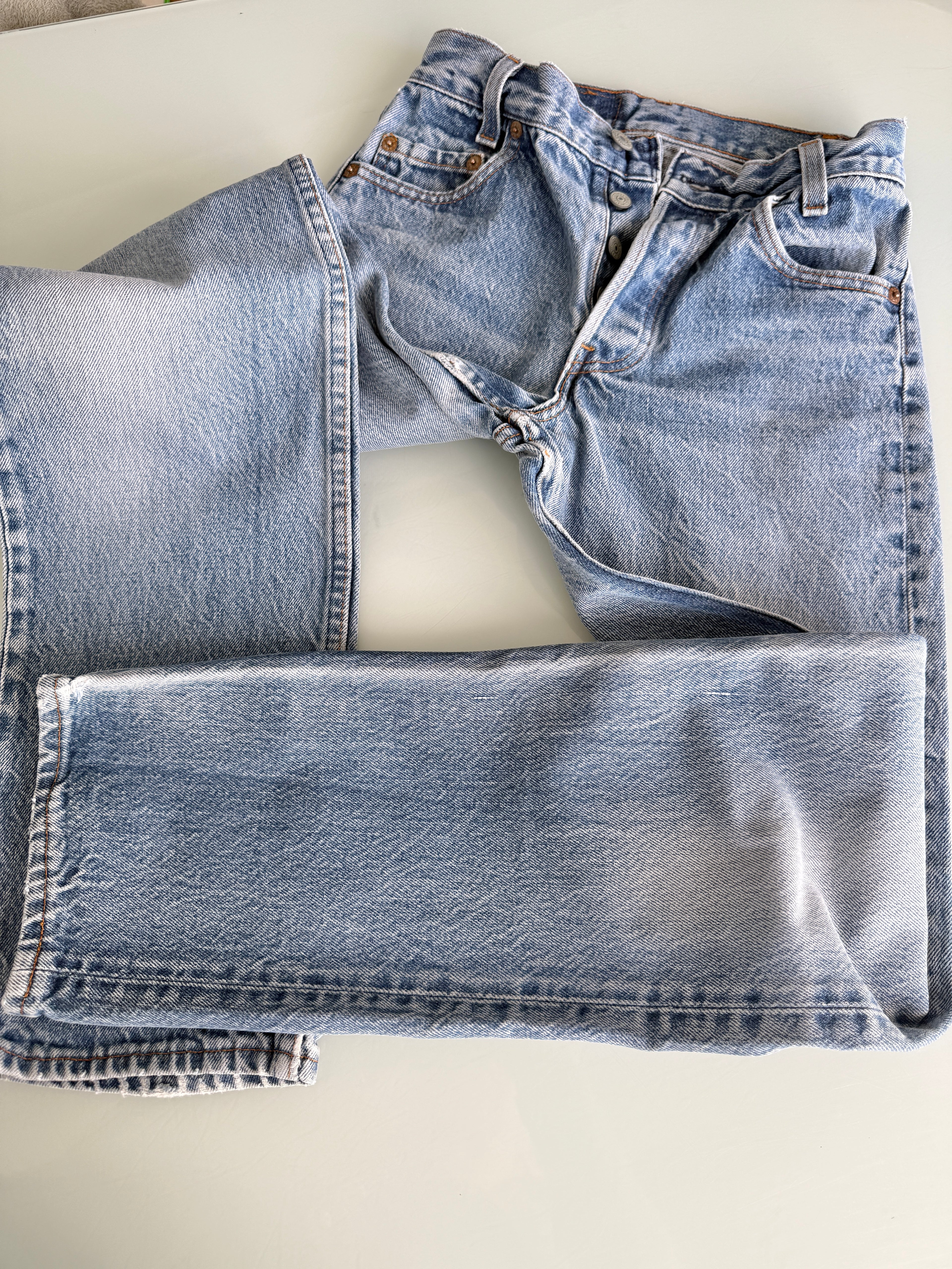 W23 L29 vintage Levis 701 22-24” measured waist faded denim made in USA 80s