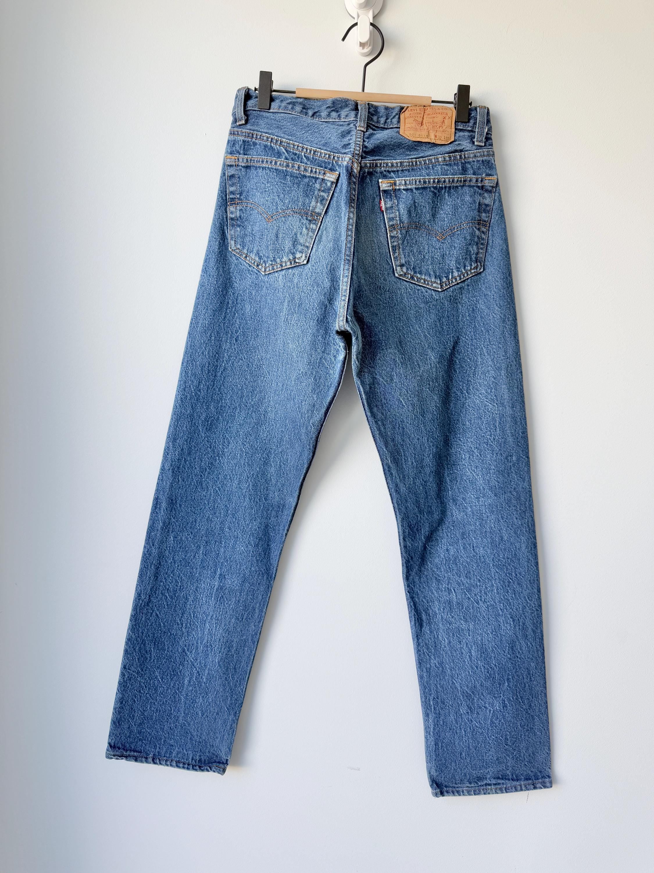 Levis 501s  vintage w30 L31 dark raw blue 501s made in USA 80s straight leg jeans 501 28”/30” waist