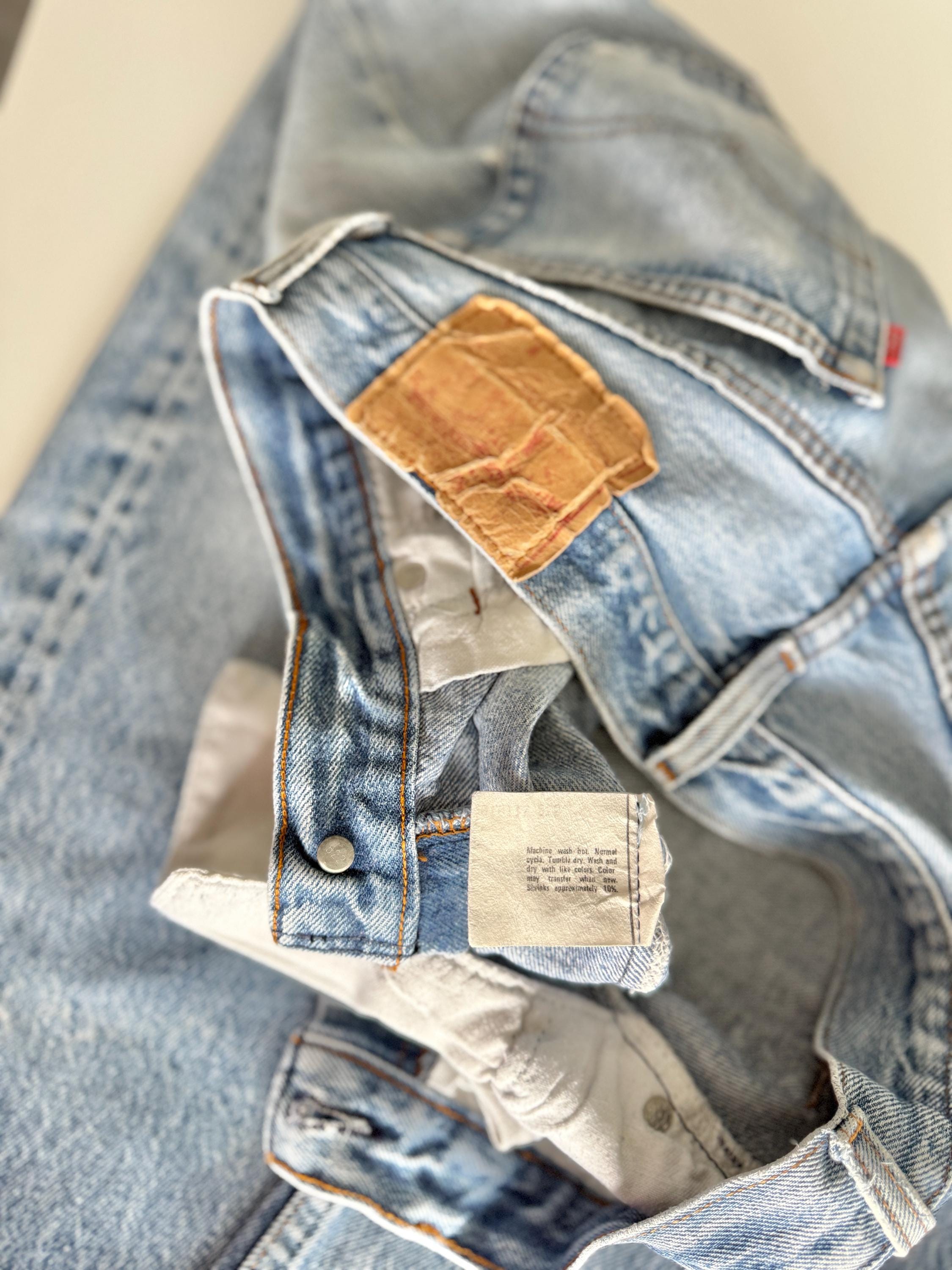 Held ***W31 L29 vintage Levis 501 29-31” measured medium faded denim made in USA 80s distressed rippped denim