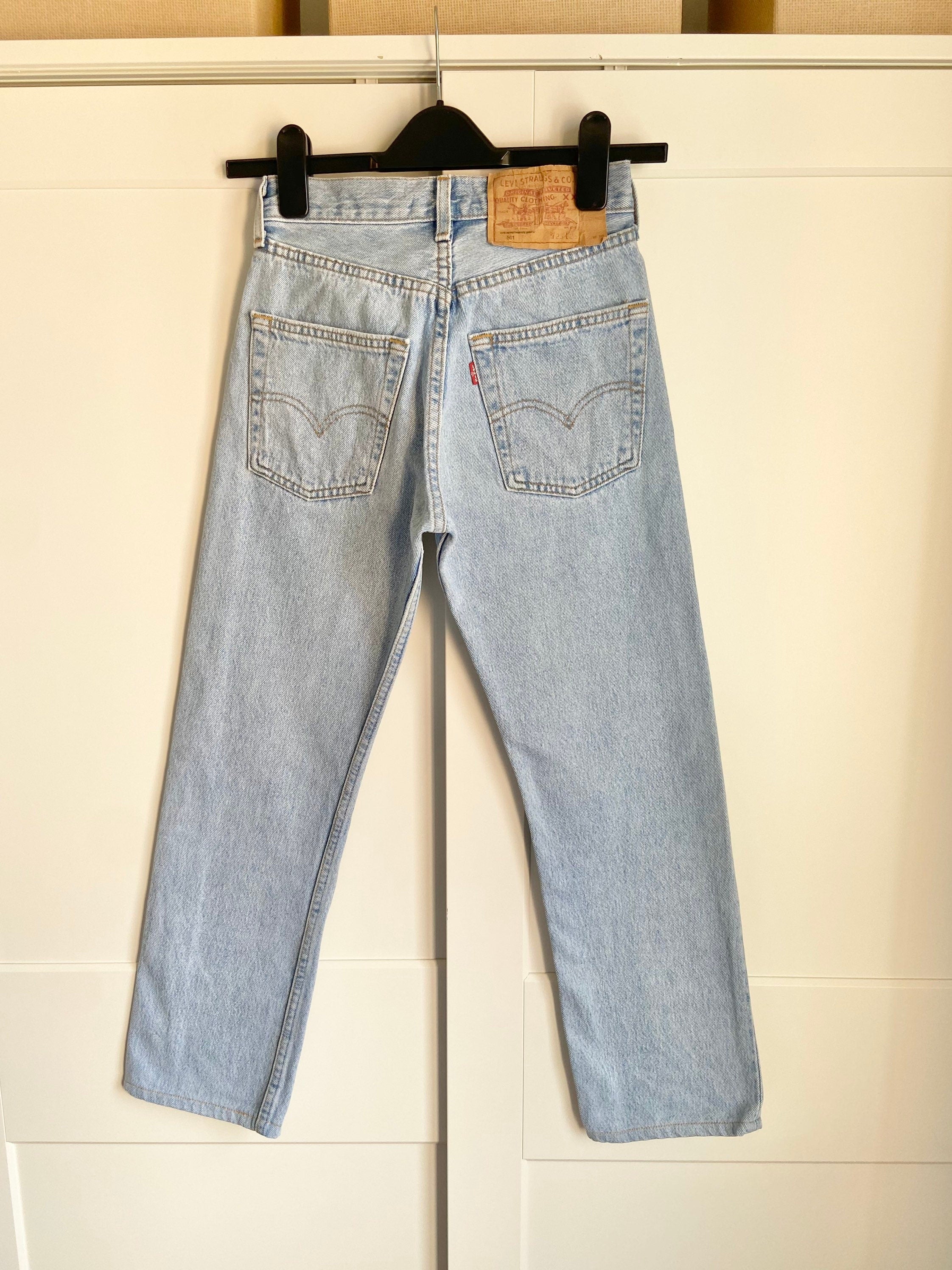 Levis 501 jeans w24 L25  light blue denim 501 made in France  vintage Levi’s faded light blue denim 90s vintage