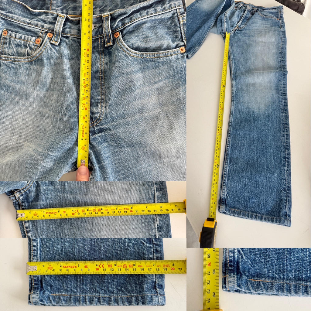 W25 L28 Levis 501 vintage 25” measured waist medium faded blue whiskers made in y2k