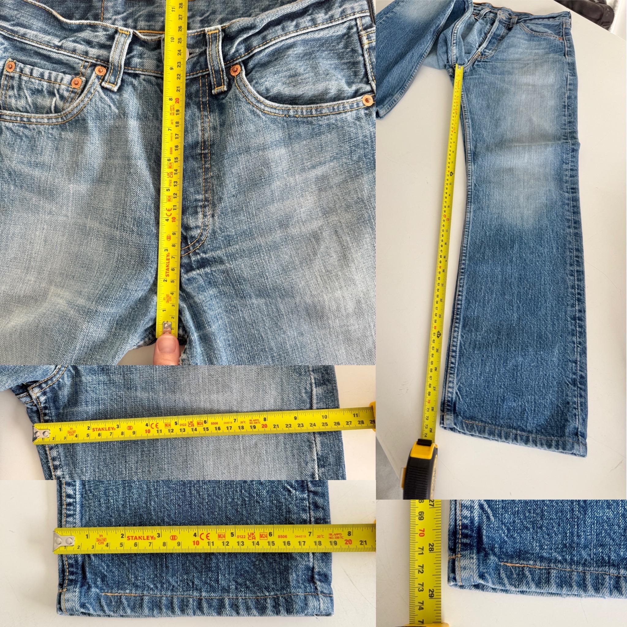 W25 L28 Levis 501 vintage 25” measured waist medium faded blue whiskers made in y2k