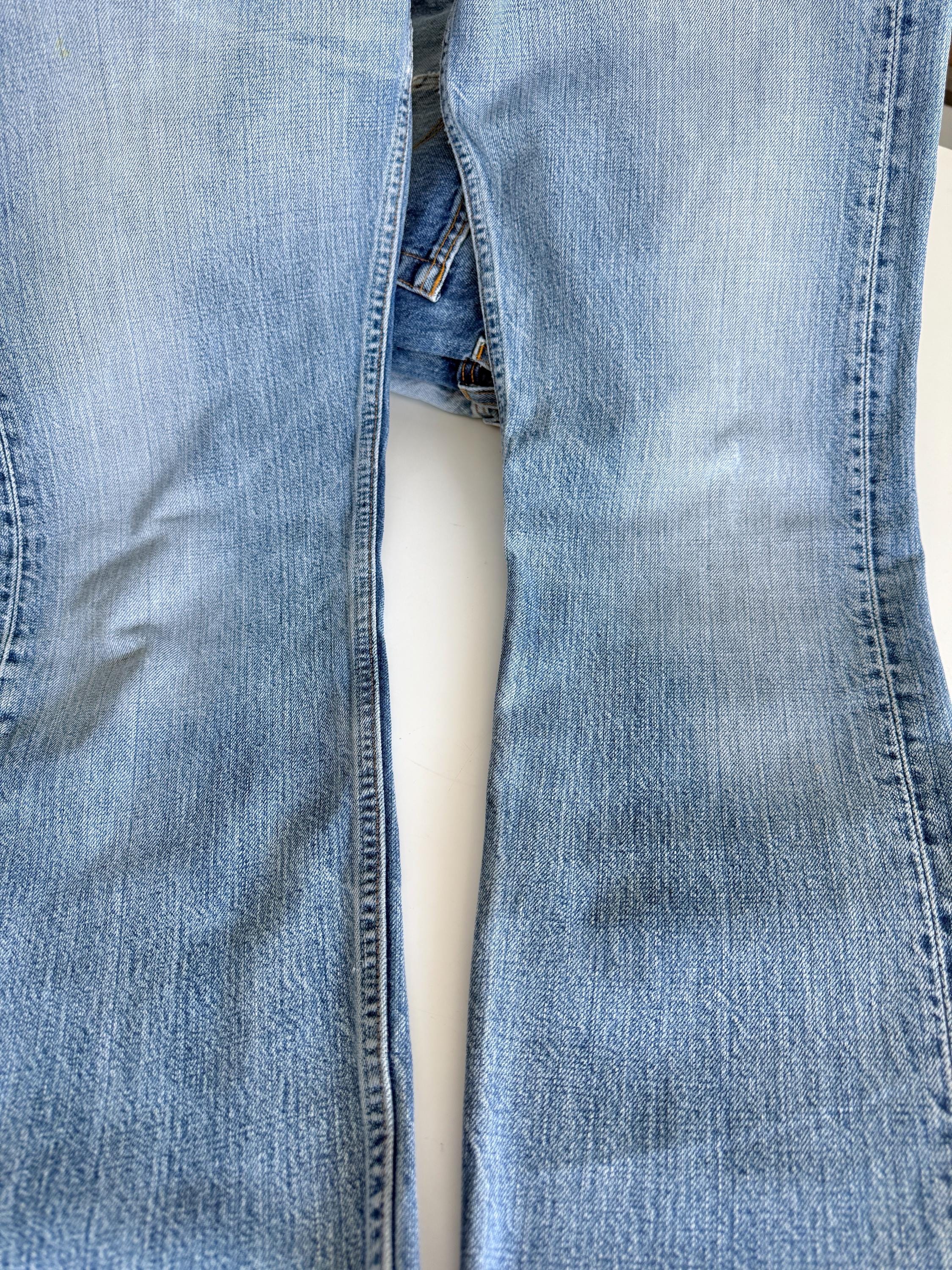 W27 L30 vintage Levis 501 27” measured waist medium faded denim made in Y2K