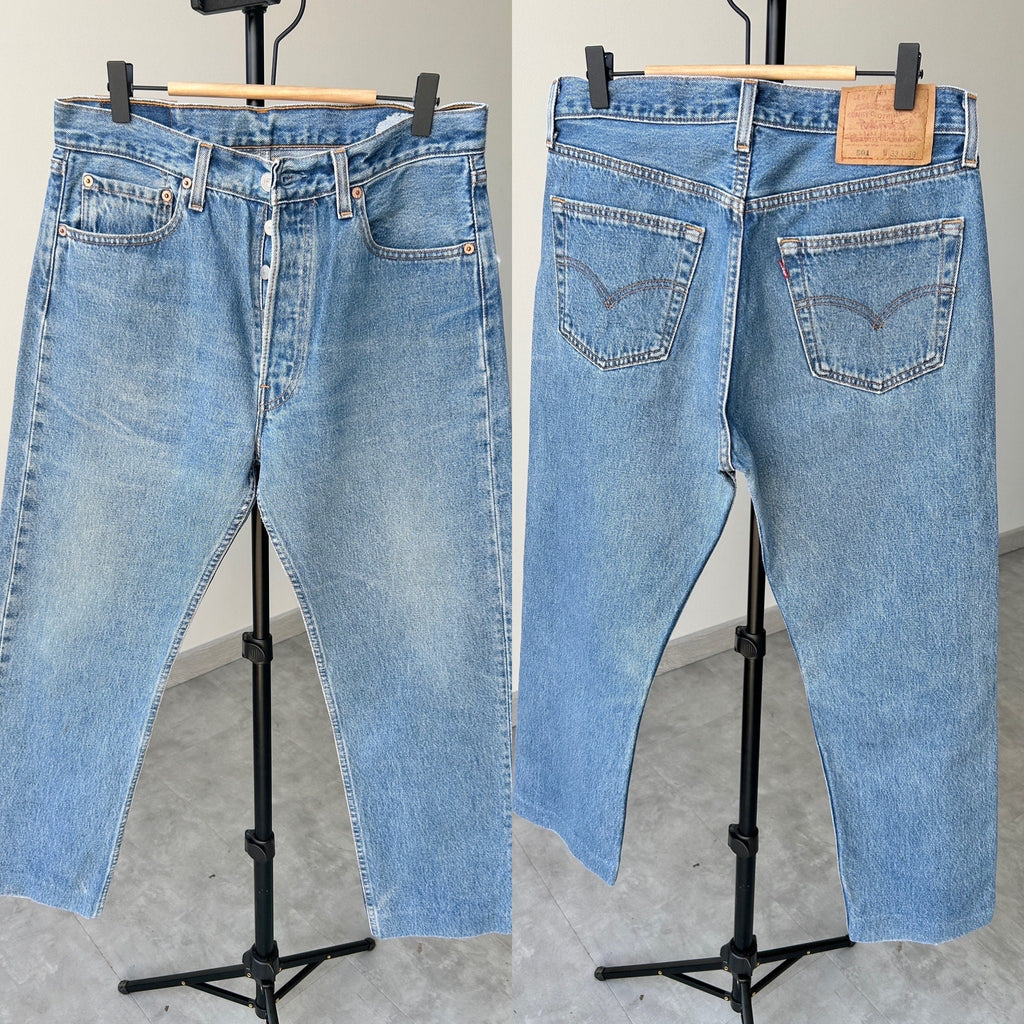 W32 L27 Levis 501 vintage faded blue denim made in 90s straight leg 501 vintage USA