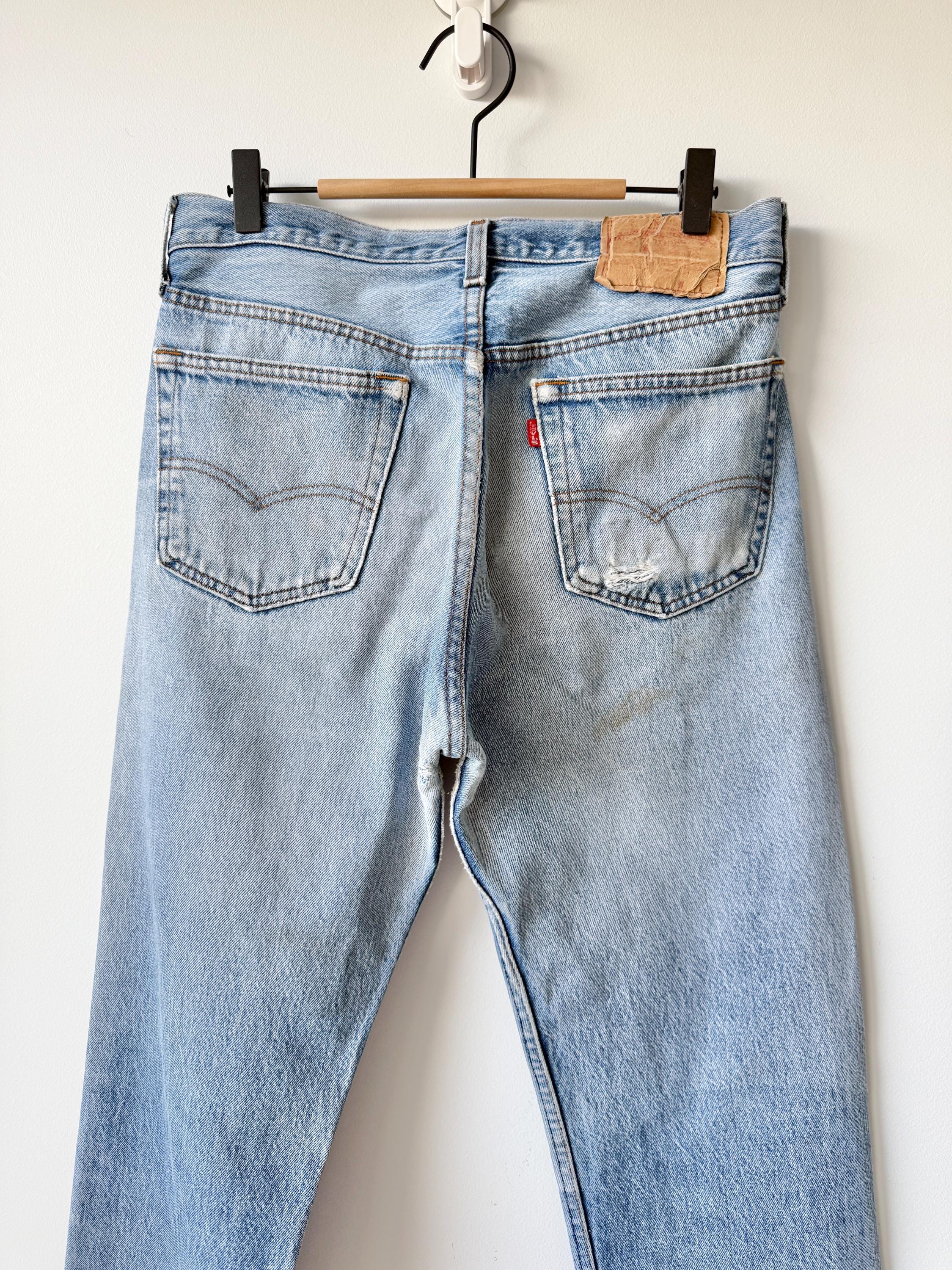 Held ***W31 L29 vintage Levis 501 29-31” measured medium faded denim made in USA 80s distressed rippped denim
