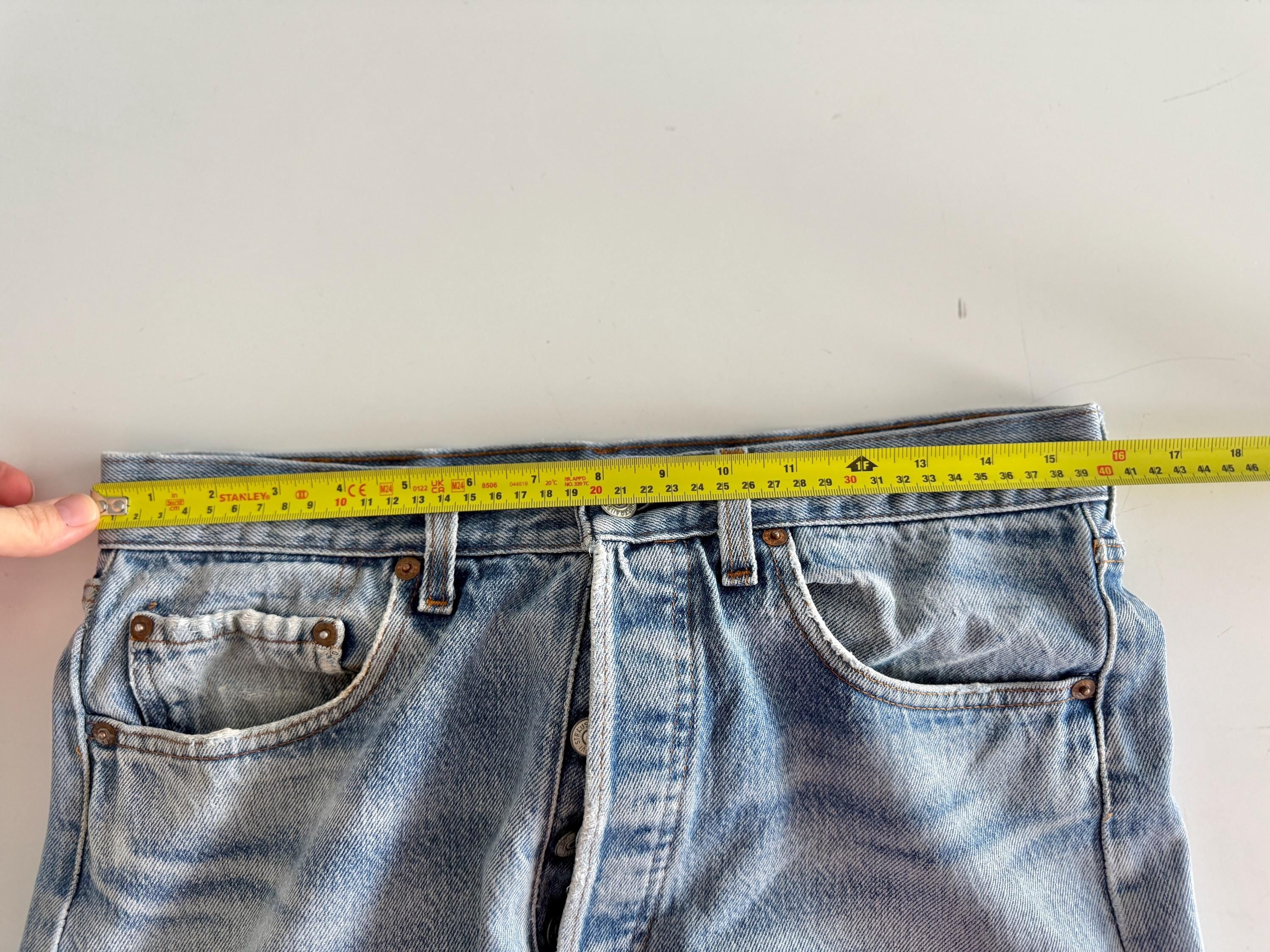 Held ***W31 L29 vintage Levis 501 29-31” measured medium faded denim made in USA 80s distressed rippped denim