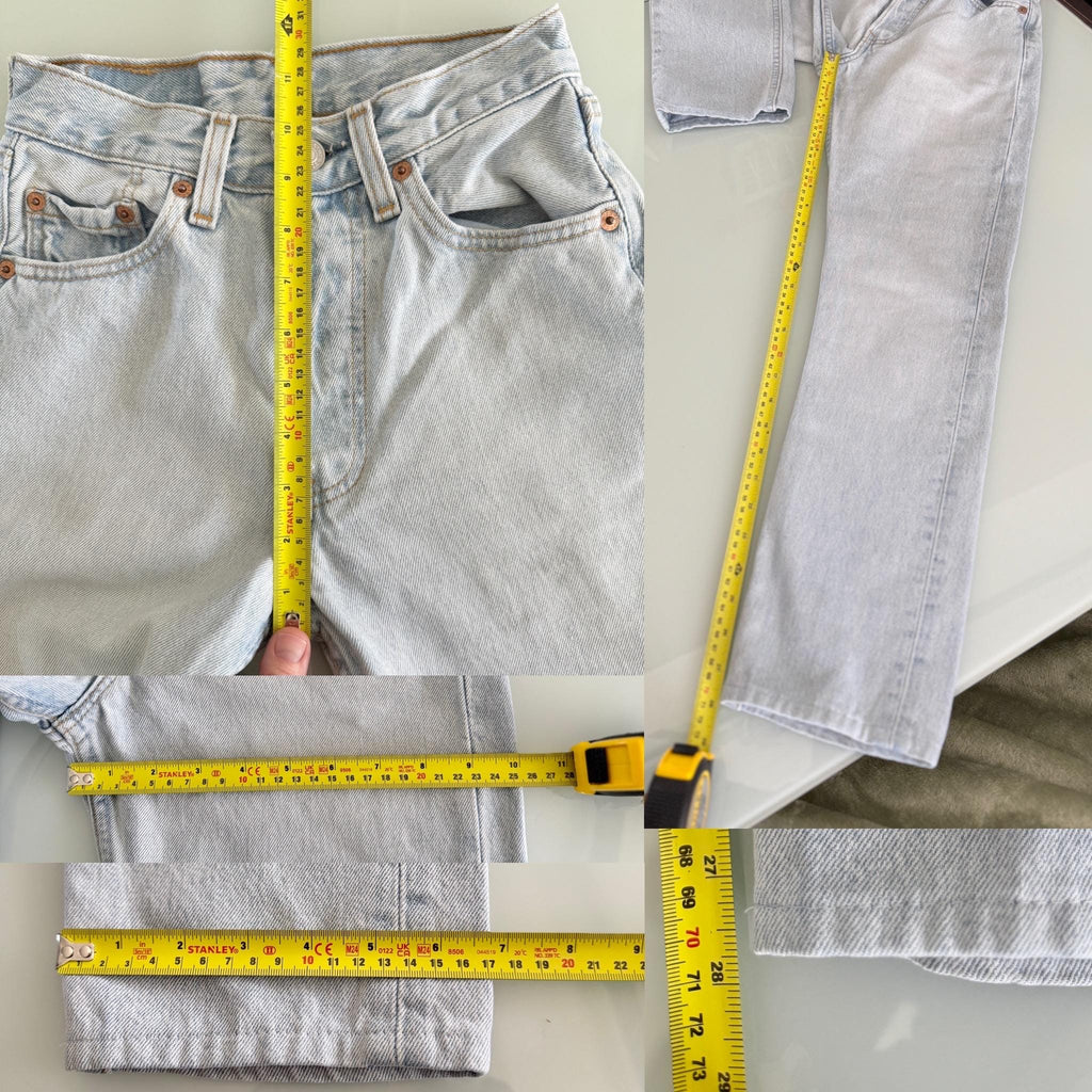 w22 L28 Levis 501 vintage light blue 501s for women tag made in USA 90s straight leg jeans 22”waist