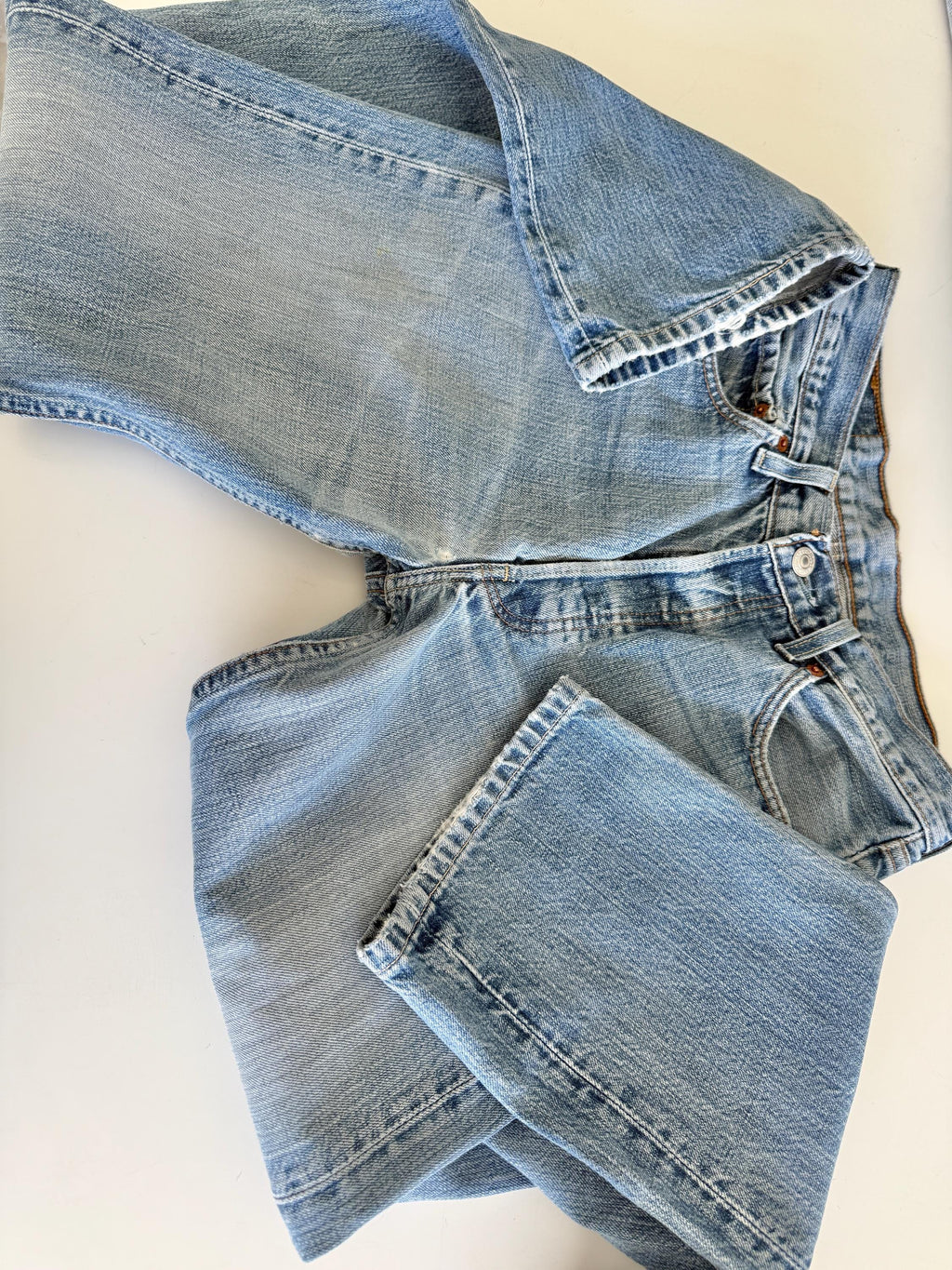 W27 L30 vintage Levis 501 27” measured waist medium faded denim made in Y2K