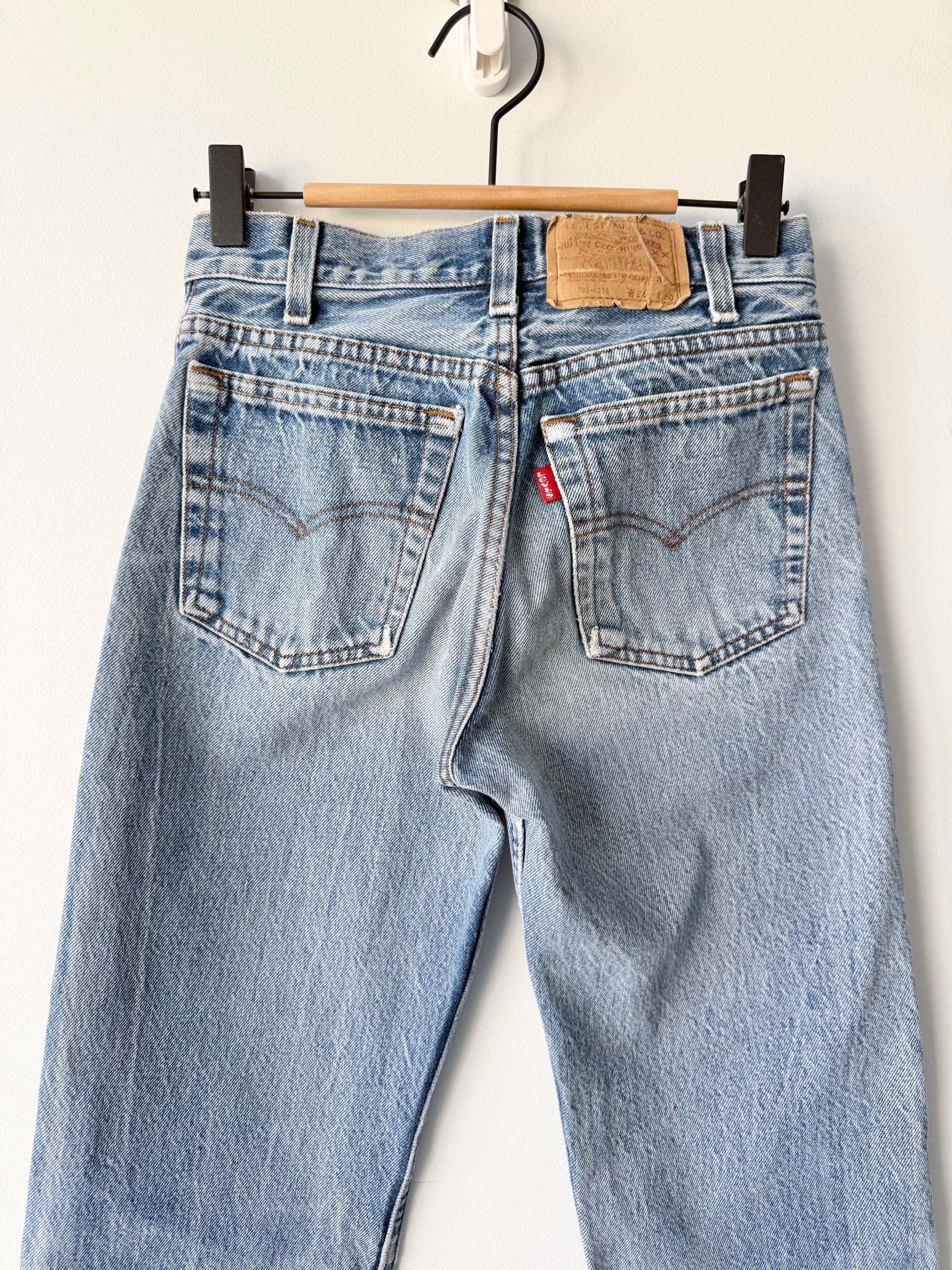 W23 L29 vintage Levis 701 22-24” measured waist faded denim made in USA 80s