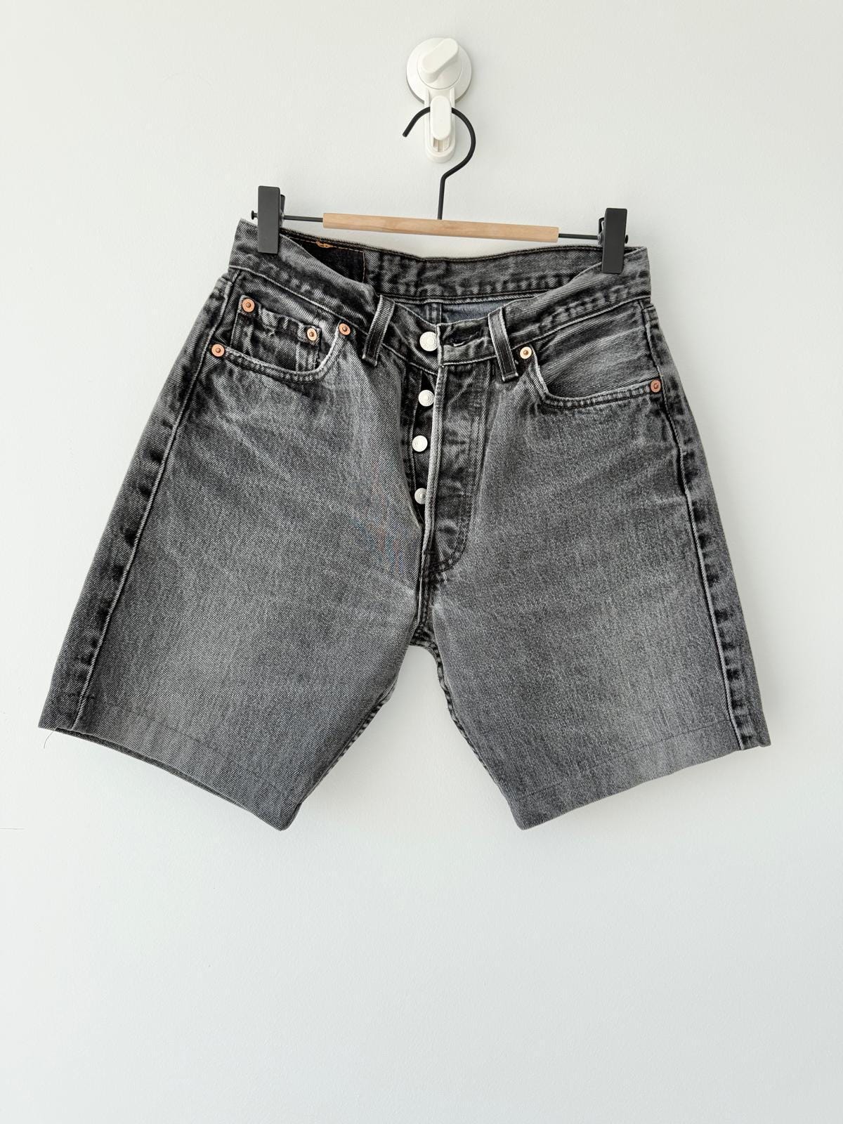 W26 Levis 501 vintage 25-26” waist black faded 501s made in USA for women 90s