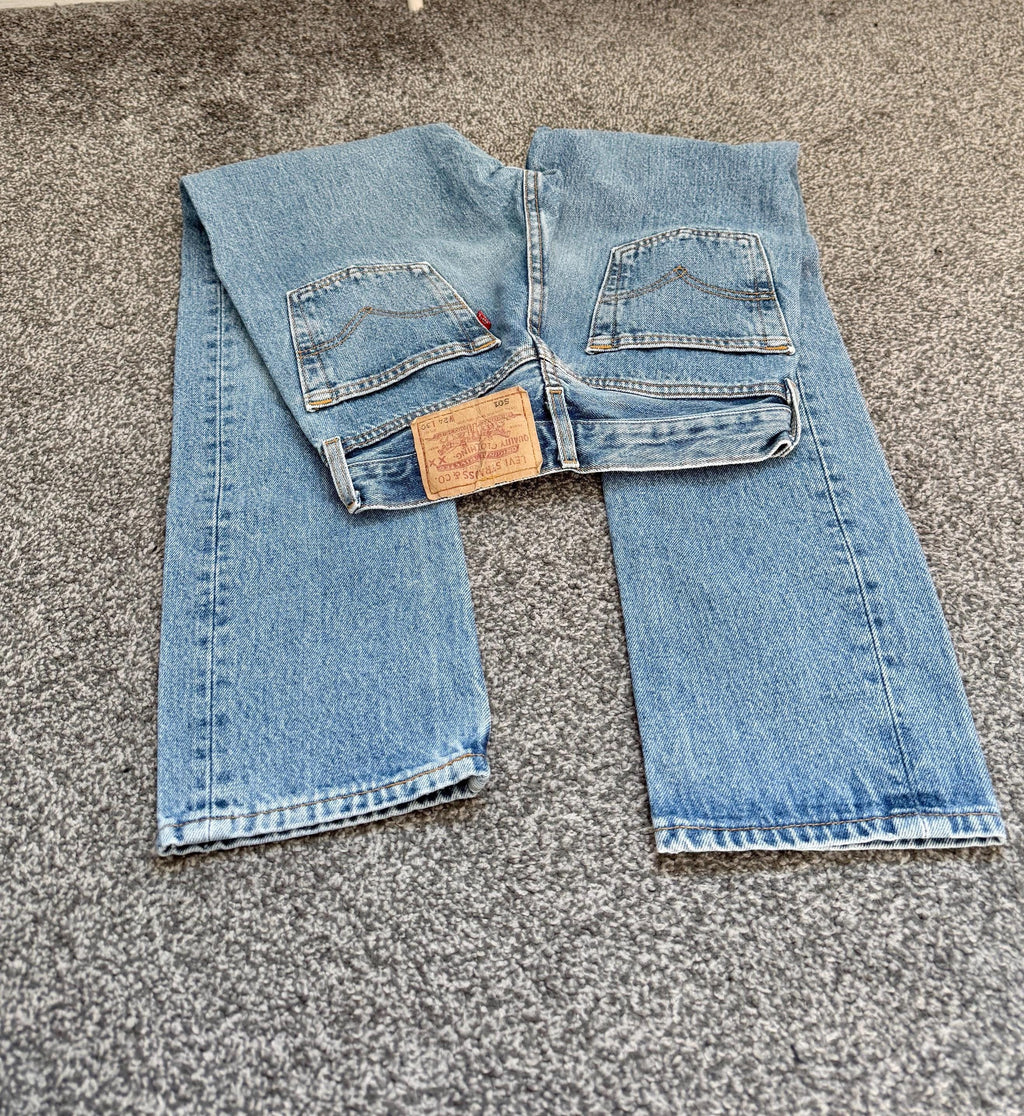 Levis 501 vintage w23 L29 Levi’s 501 light faded blue 90s Levi’s blue straight leg blue 501 vintage blue 501 worn vintage Levi’s