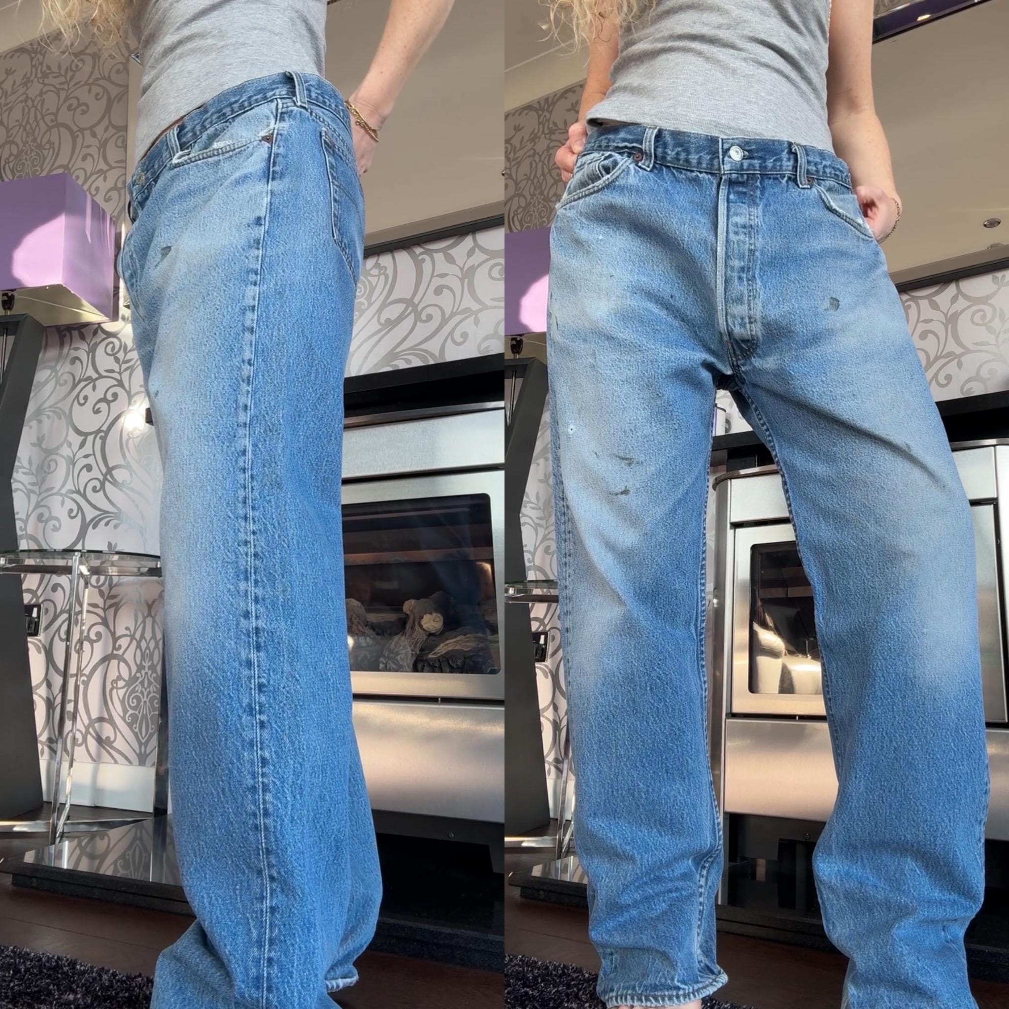 w35 L30 Levis 501 vintage medium blue stained distressed  blue 501s made in USA 80s straight leg measured 34-35” waist