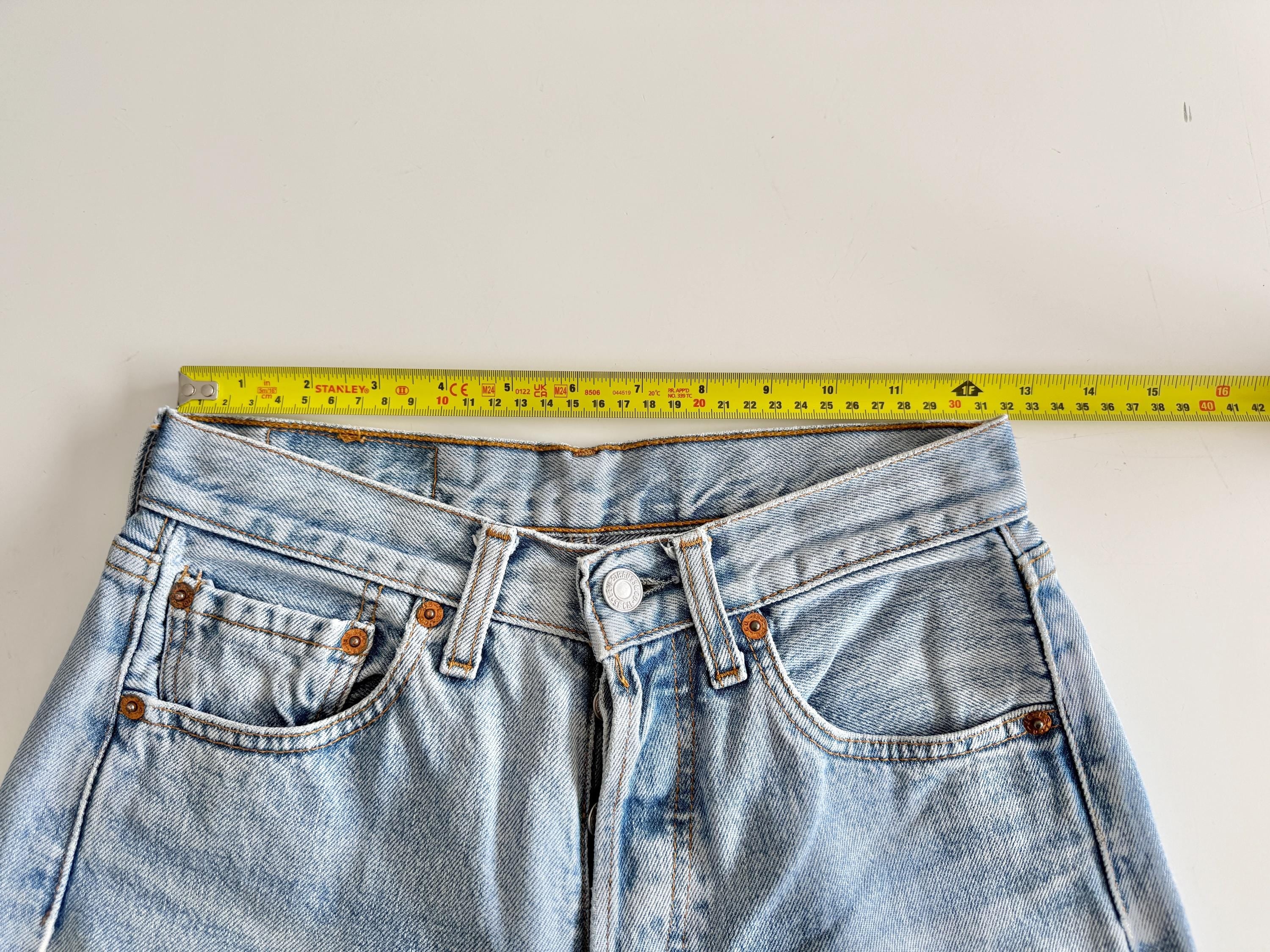 W25 L29 vintage Levis 501 24-25” measured waist light blue faded made in 90s