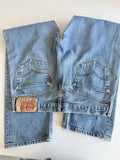 W33 L30 Levis 501 vintage 33” measured waist medium blue made in Y2K