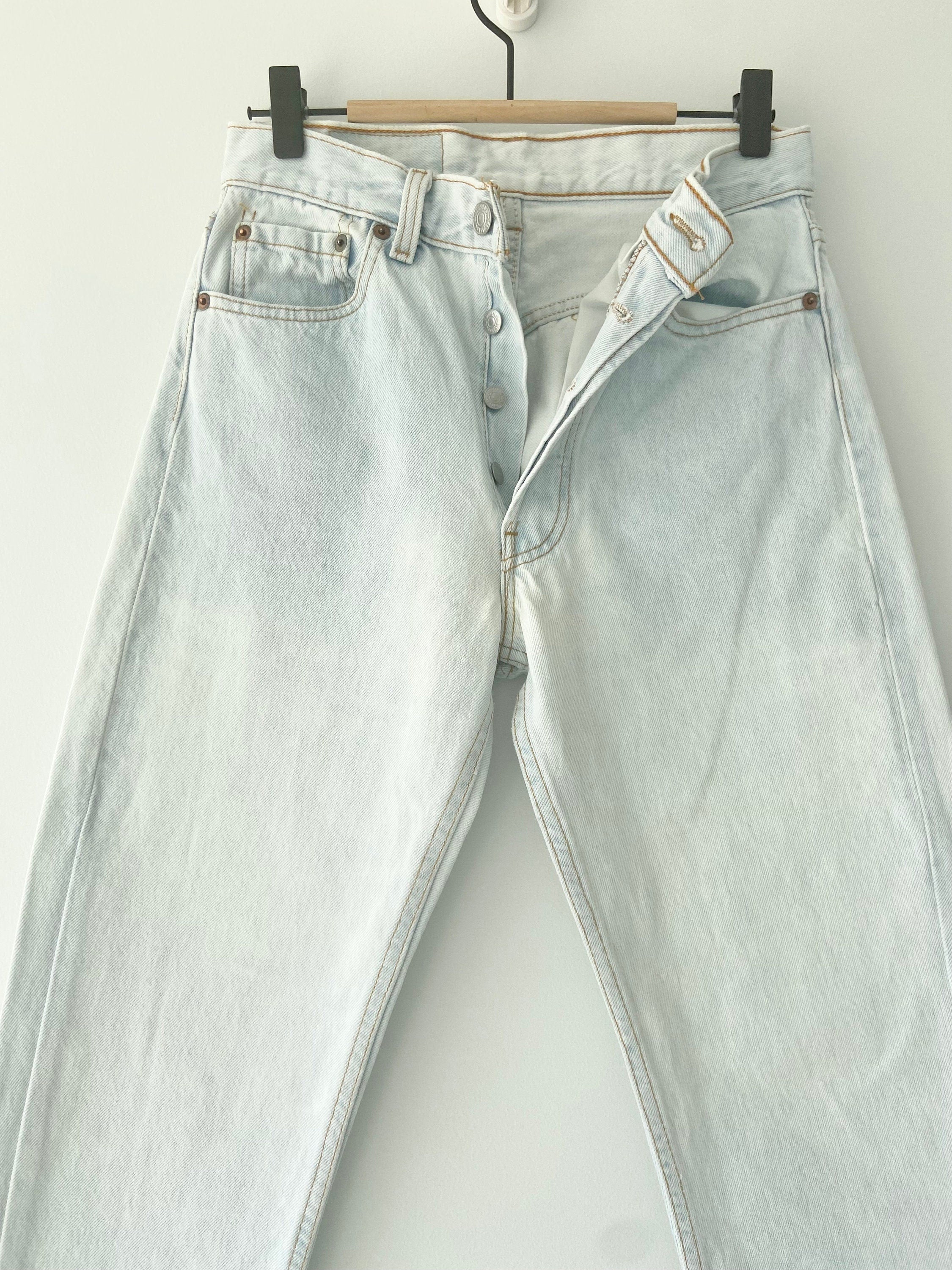 Vintage Levi’s 501 jeans w26 L27  made in USA  1995 light blue faded vintage 501 jeans