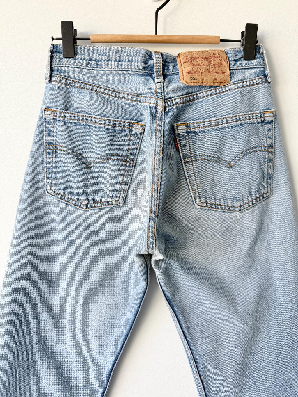 W25 L33 vintage Levis 501 24-25” measured waist light faded denim made in 90s